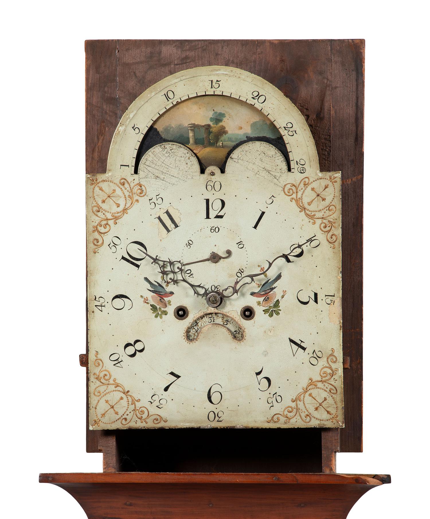 A Chippendale Cherrywood Tall Case Clock