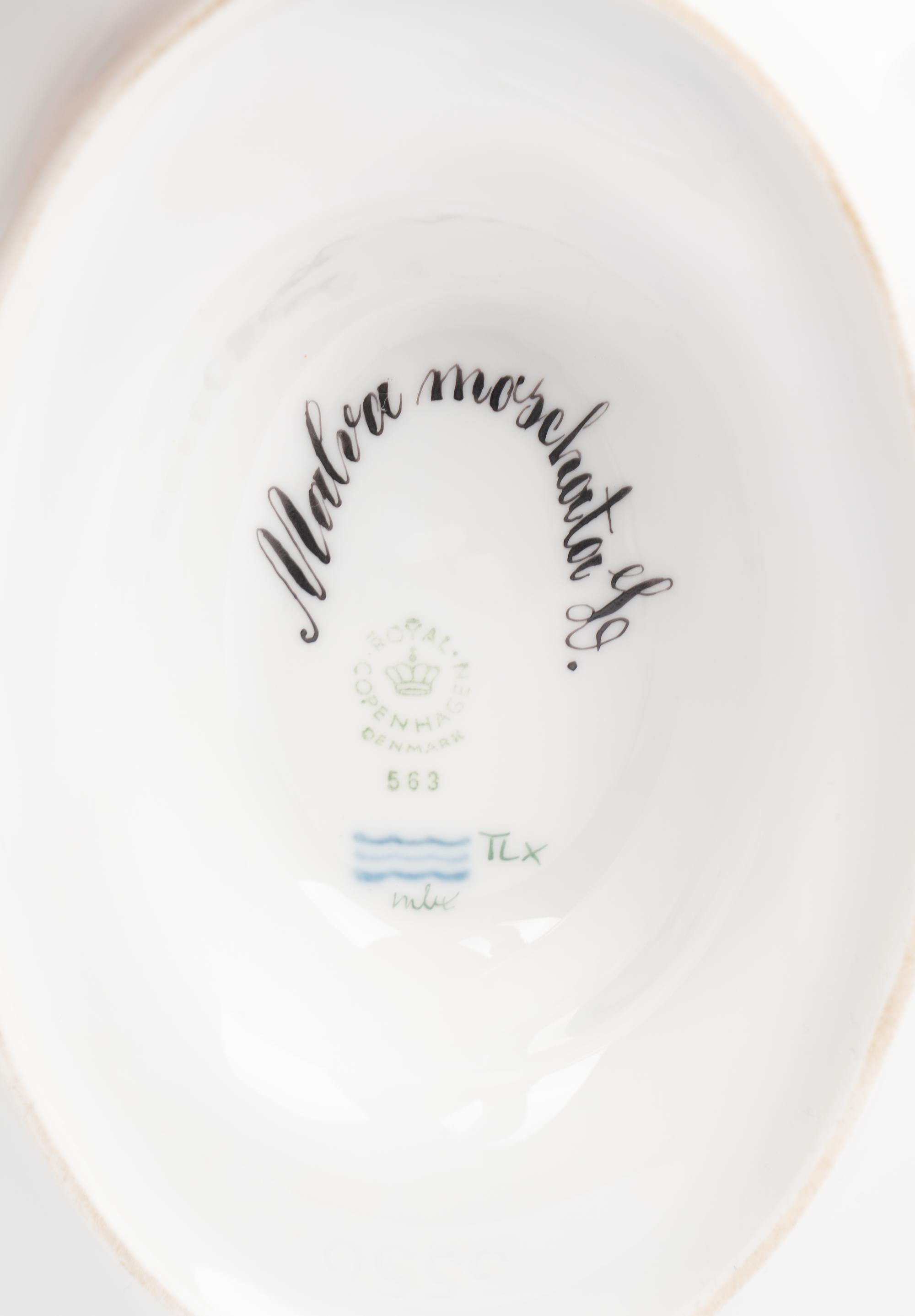 A Royal Copenhagen Flora Danica Porcelain Sauce Boat and Fixed Stand