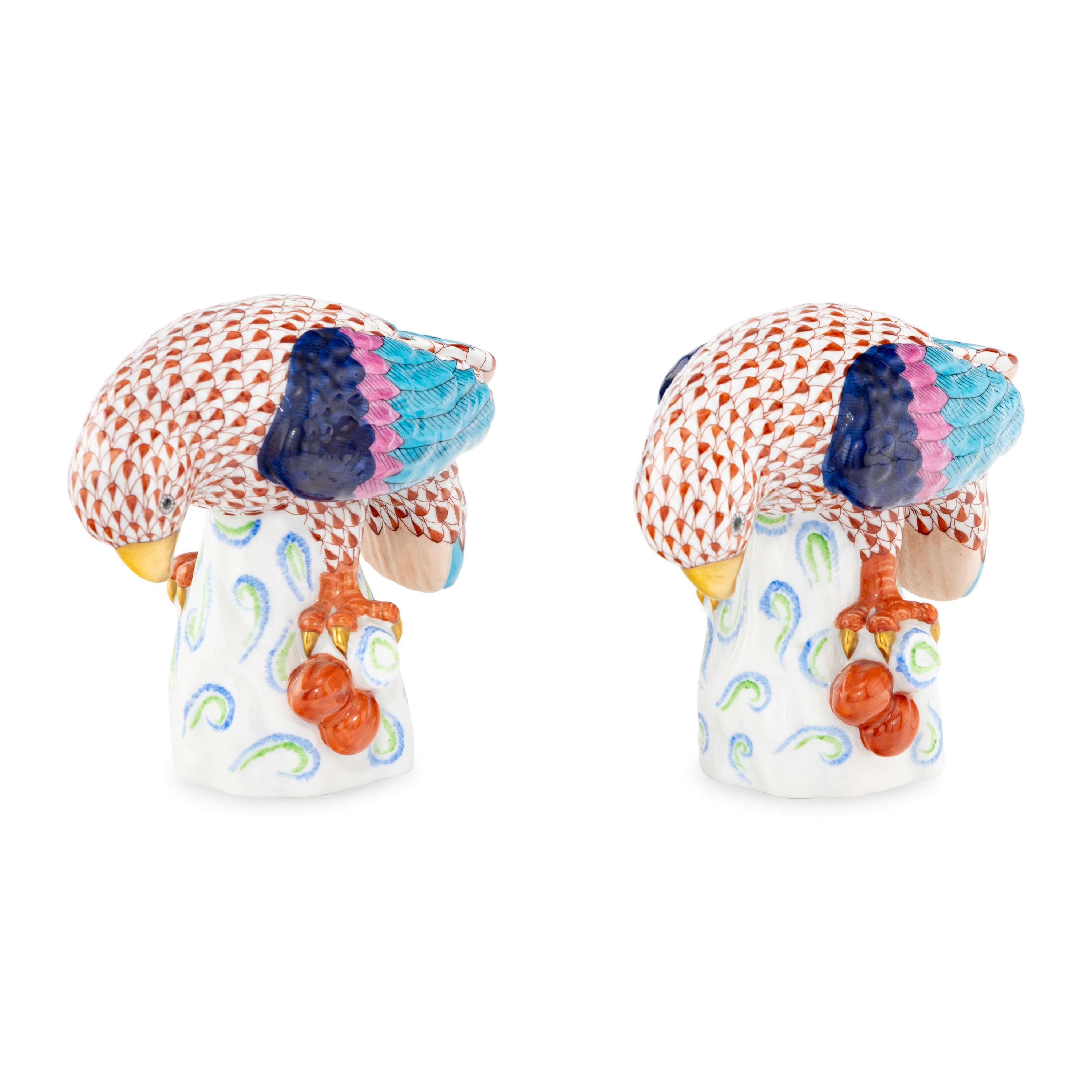 A Pair of Herend Fishnet Porcelain Parrot Figurines