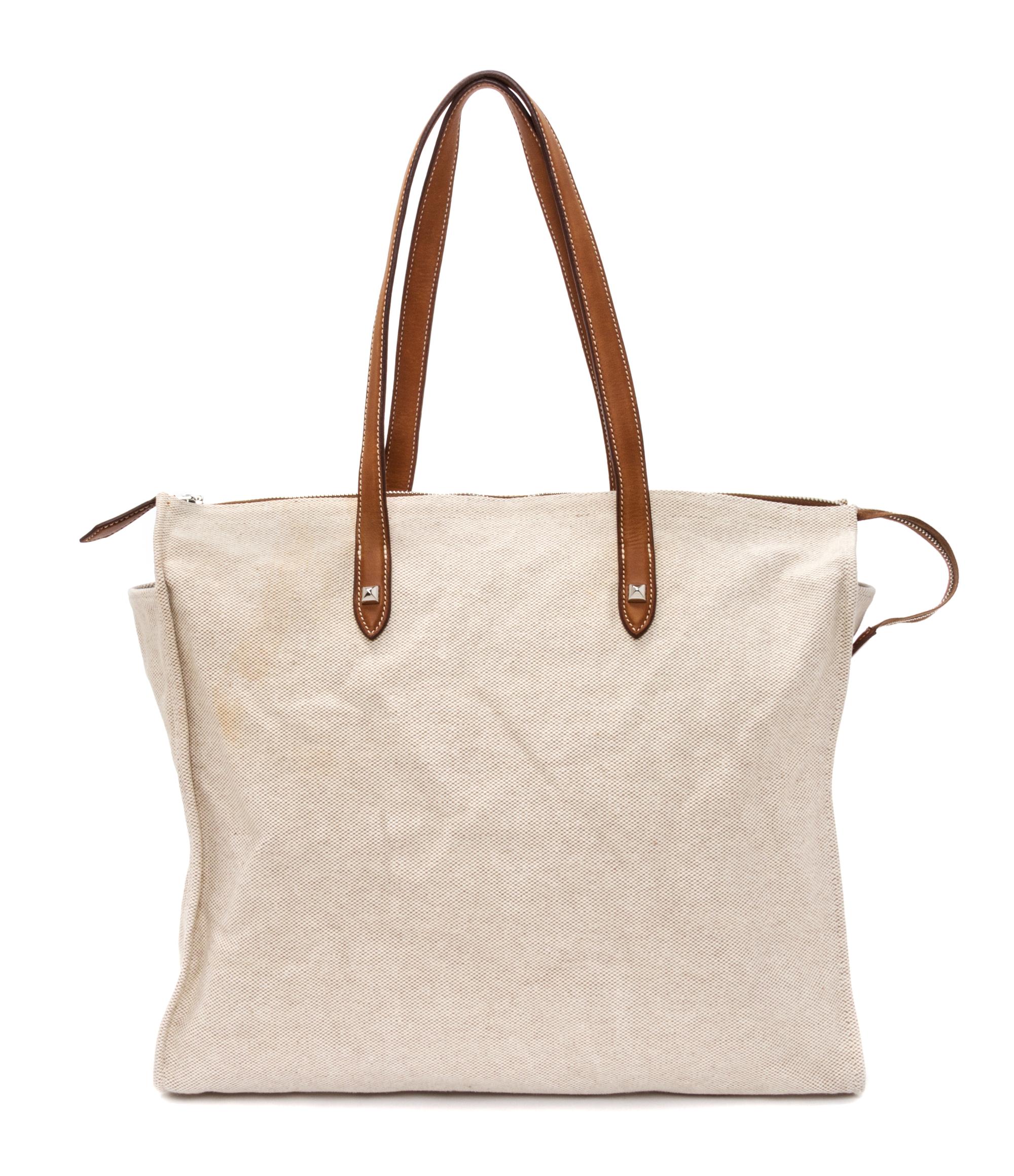An Hermes Ecru Toile and Veau Barenia Mira Tote Bag, 14" x 14" x 5.5".