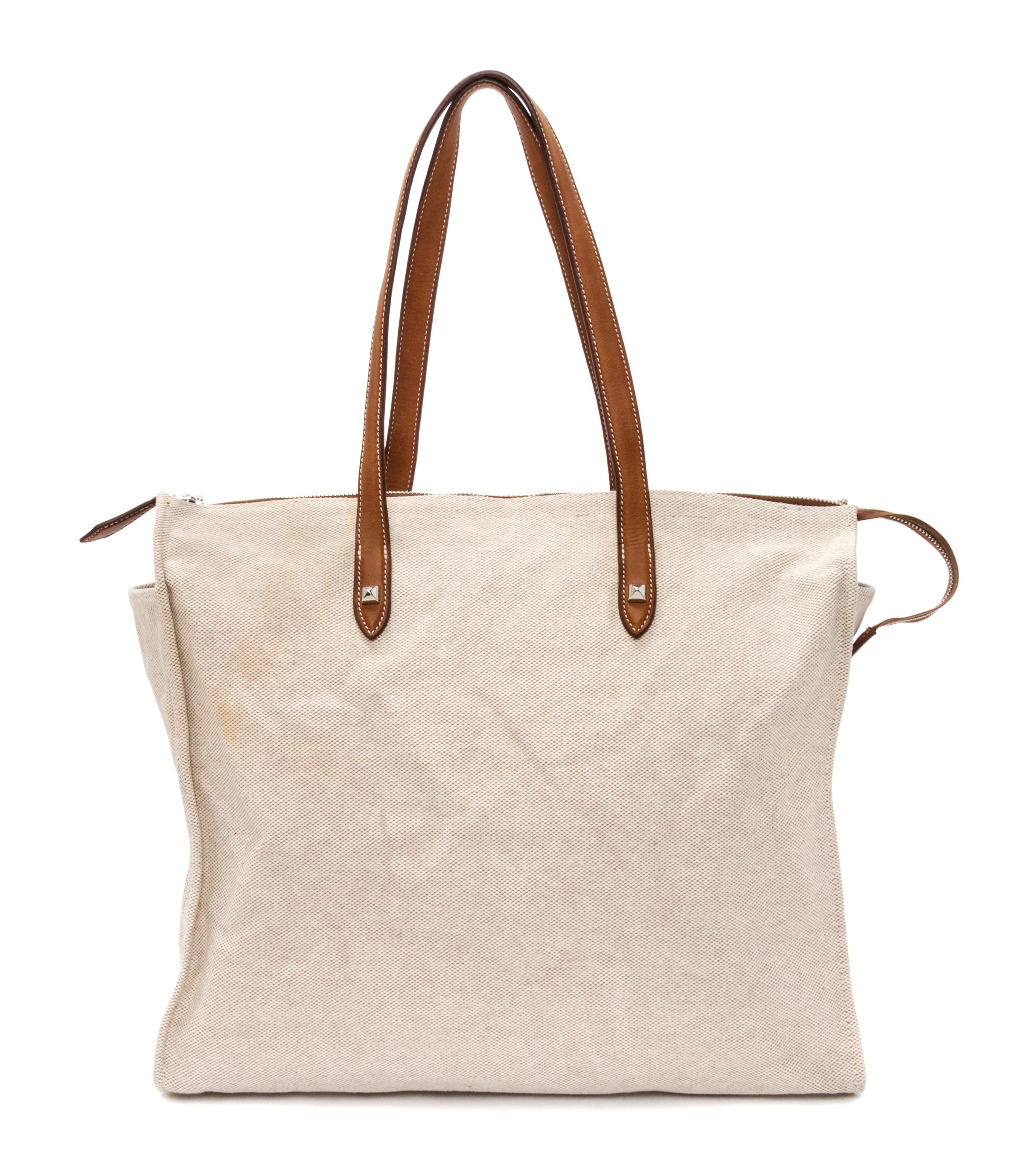 An Hermes Ecru Toile and Veau Barenia Mira Tote Bag, 14" x 14" x 5.5".