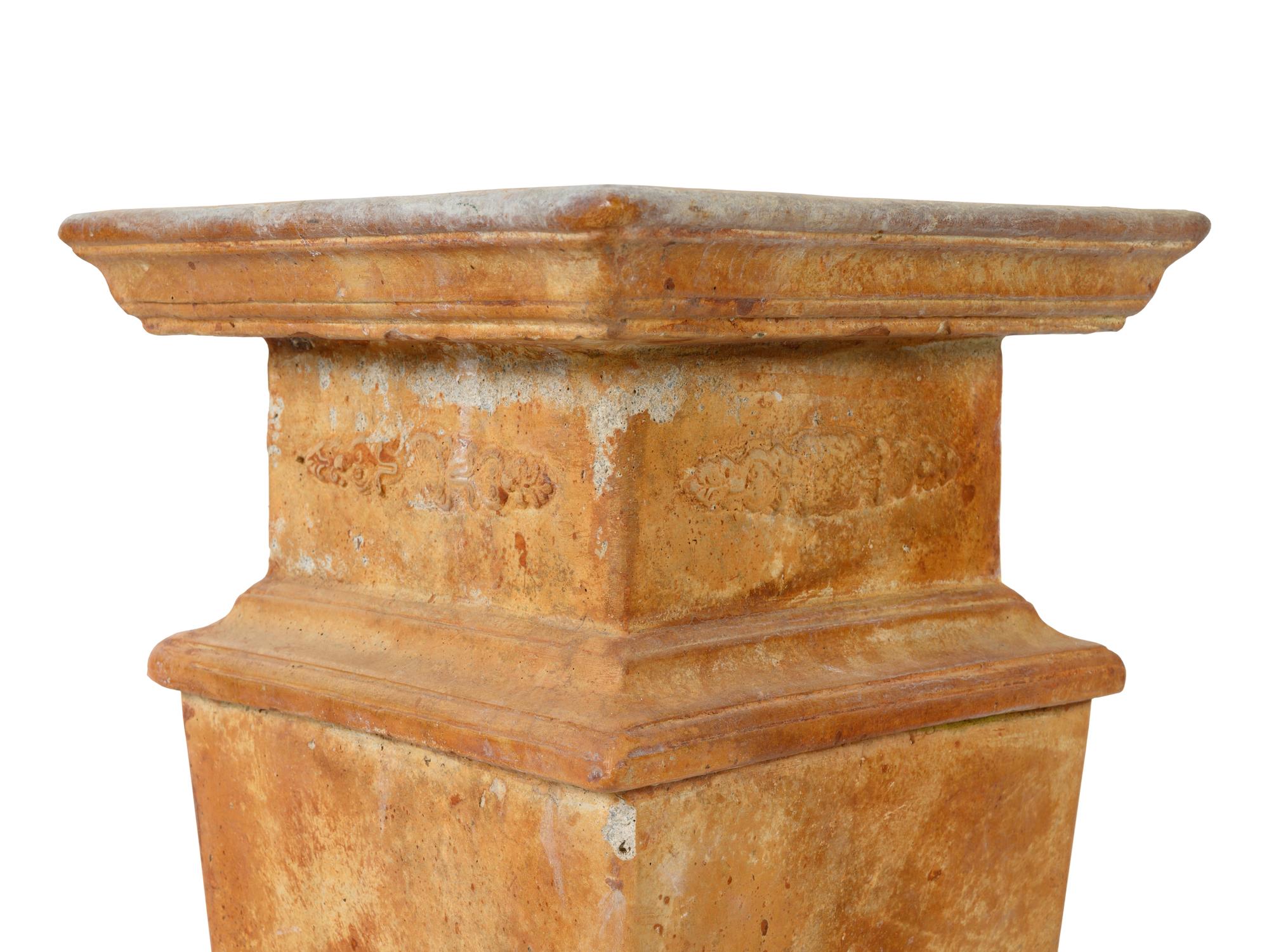 A Group of Six Cast Stone Pedestals