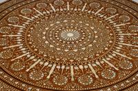 An Italian Inlaid Whimsical Peacock-Motif Table