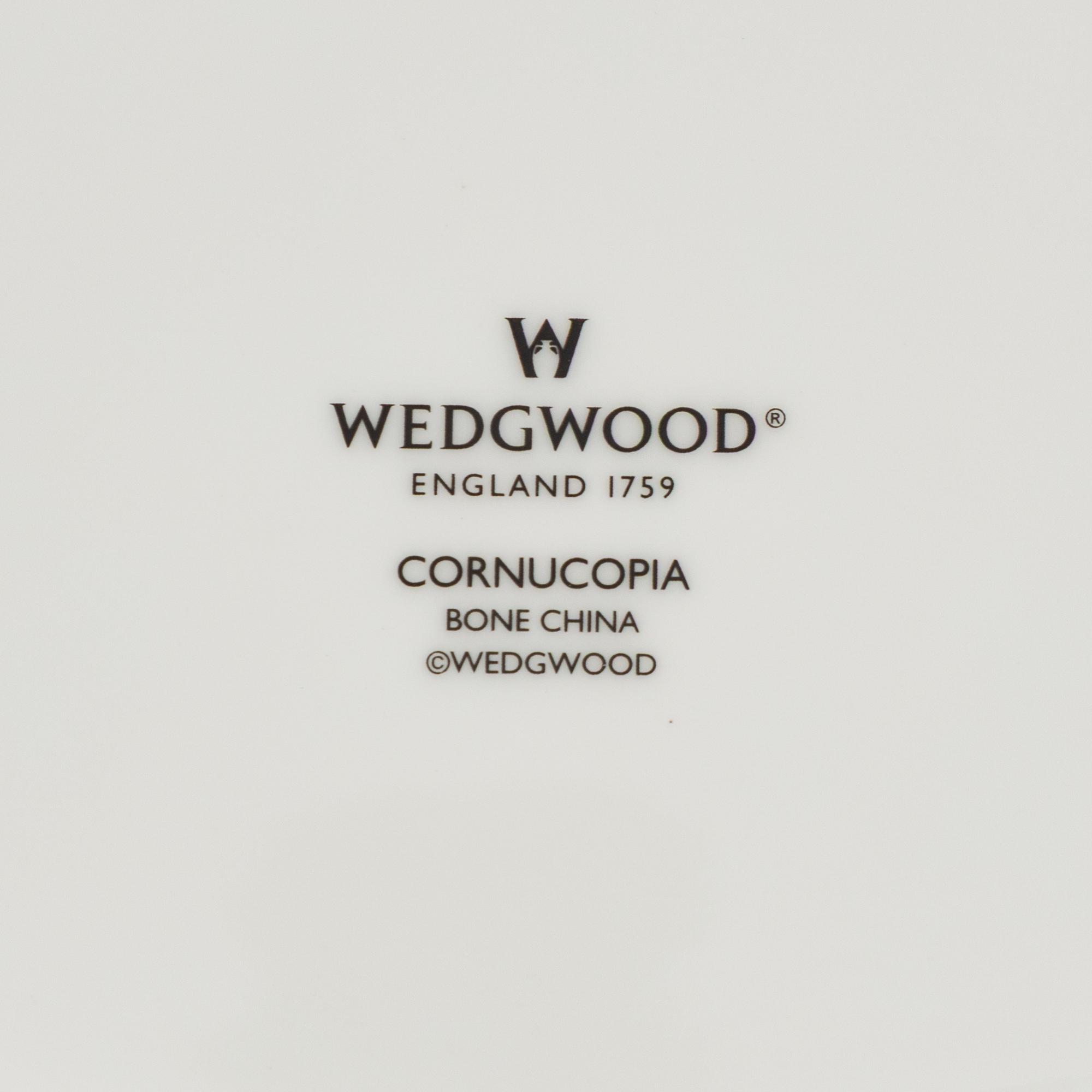 A Wedgwood Cornucopia Porcelain Dinner Service