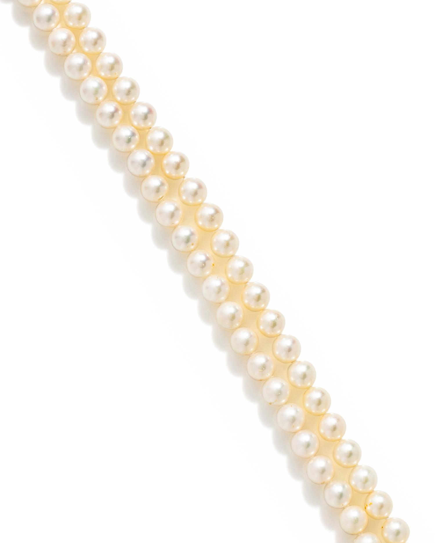 MIKIMOTO, PAIR OF CULTURED PEARL NECKLACES