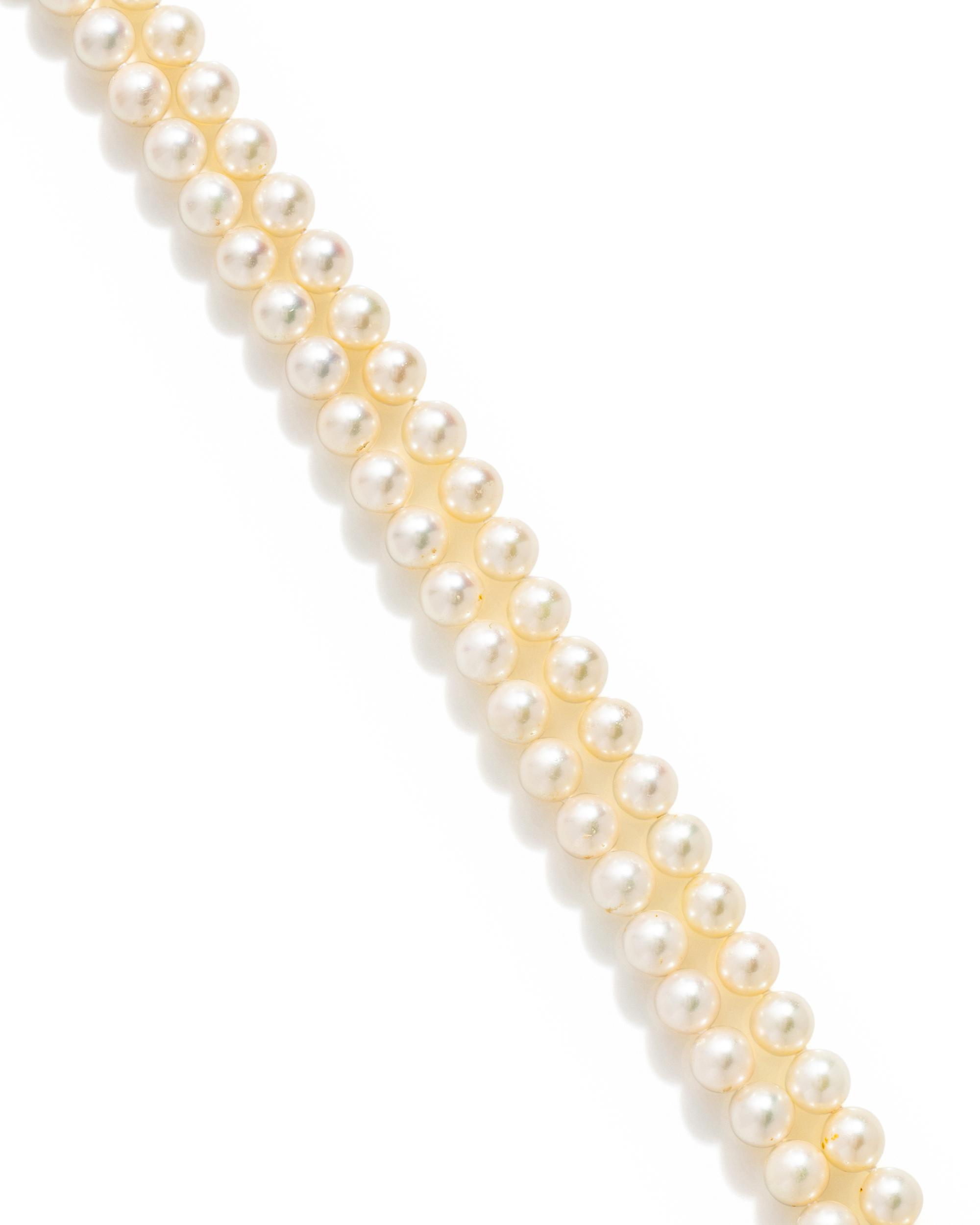 MIKIMOTO, PAIR OF CULTURED PEARL NECKLACES