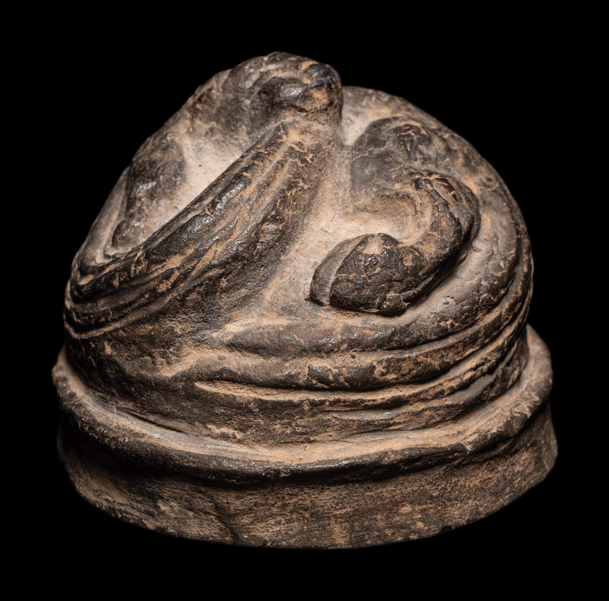 A Chinese Grey Pottery Weight