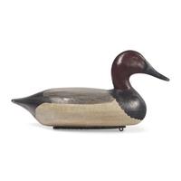 A Carved and Painted Wood Combed Canvasback Duck Decoy