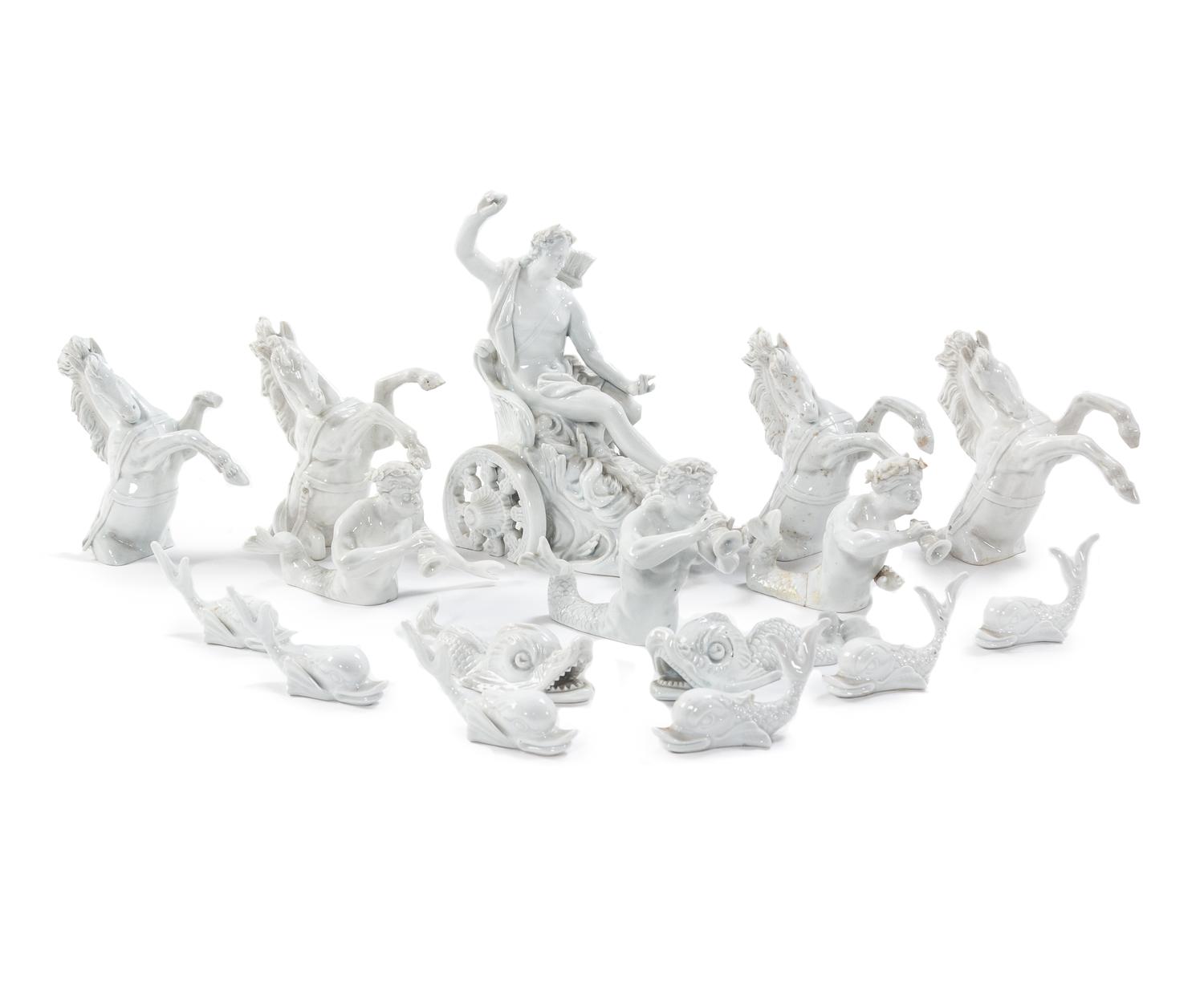 A Continental Blanc de Chine Sixteen-Piece Table Garniture