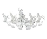A Continental Blanc de Chine Sixteen-Piece Table Garniture