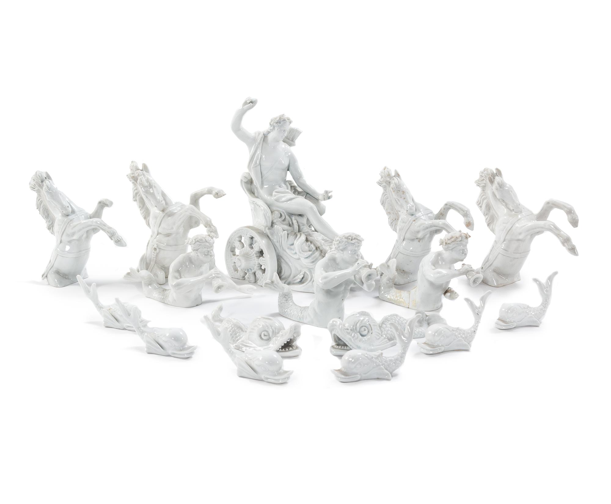 A Continental Blanc de Chine Sixteen-Piece Table Garniture
