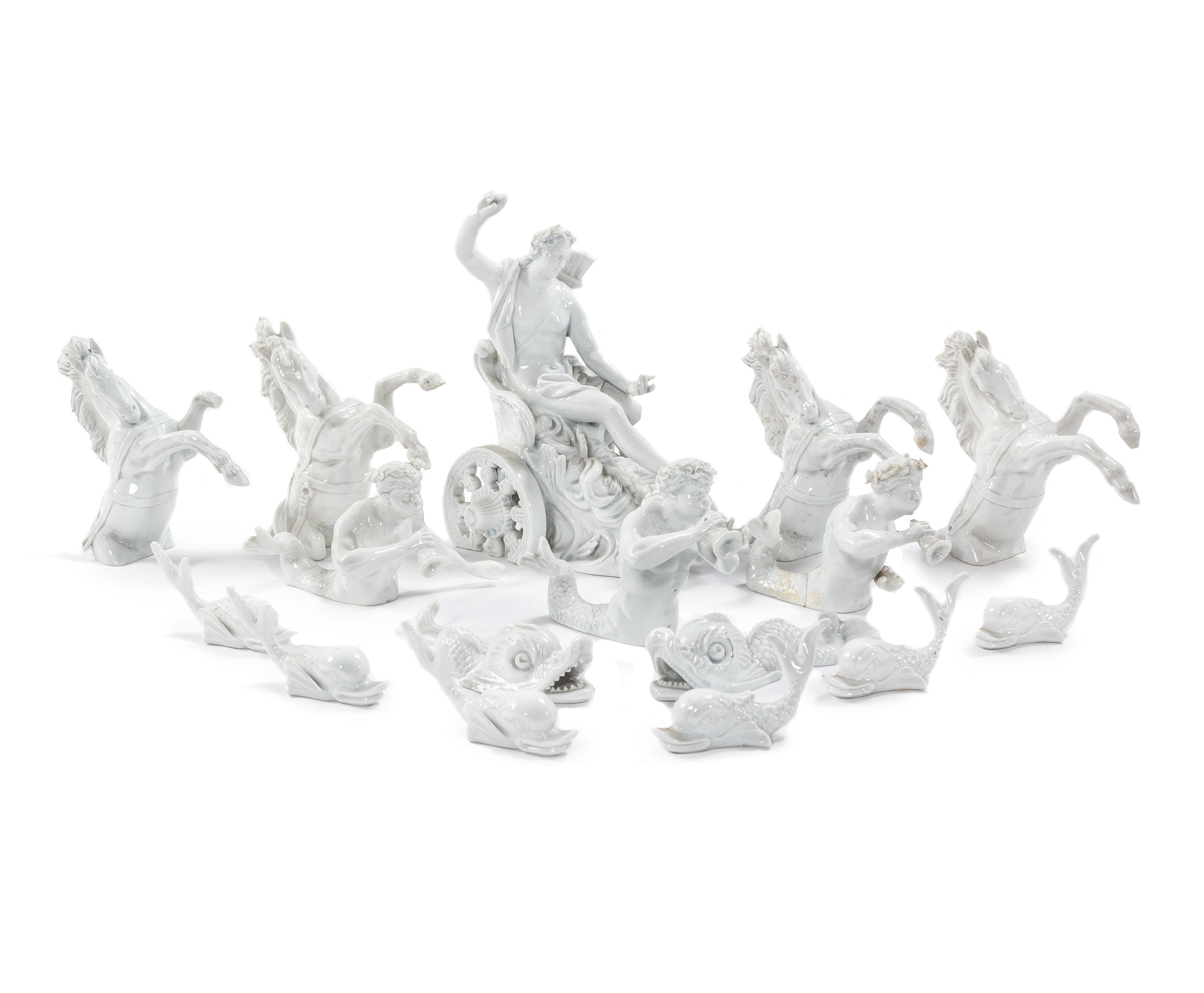 A Continental Blanc de Chine Sixteen-Piece Table Garniture