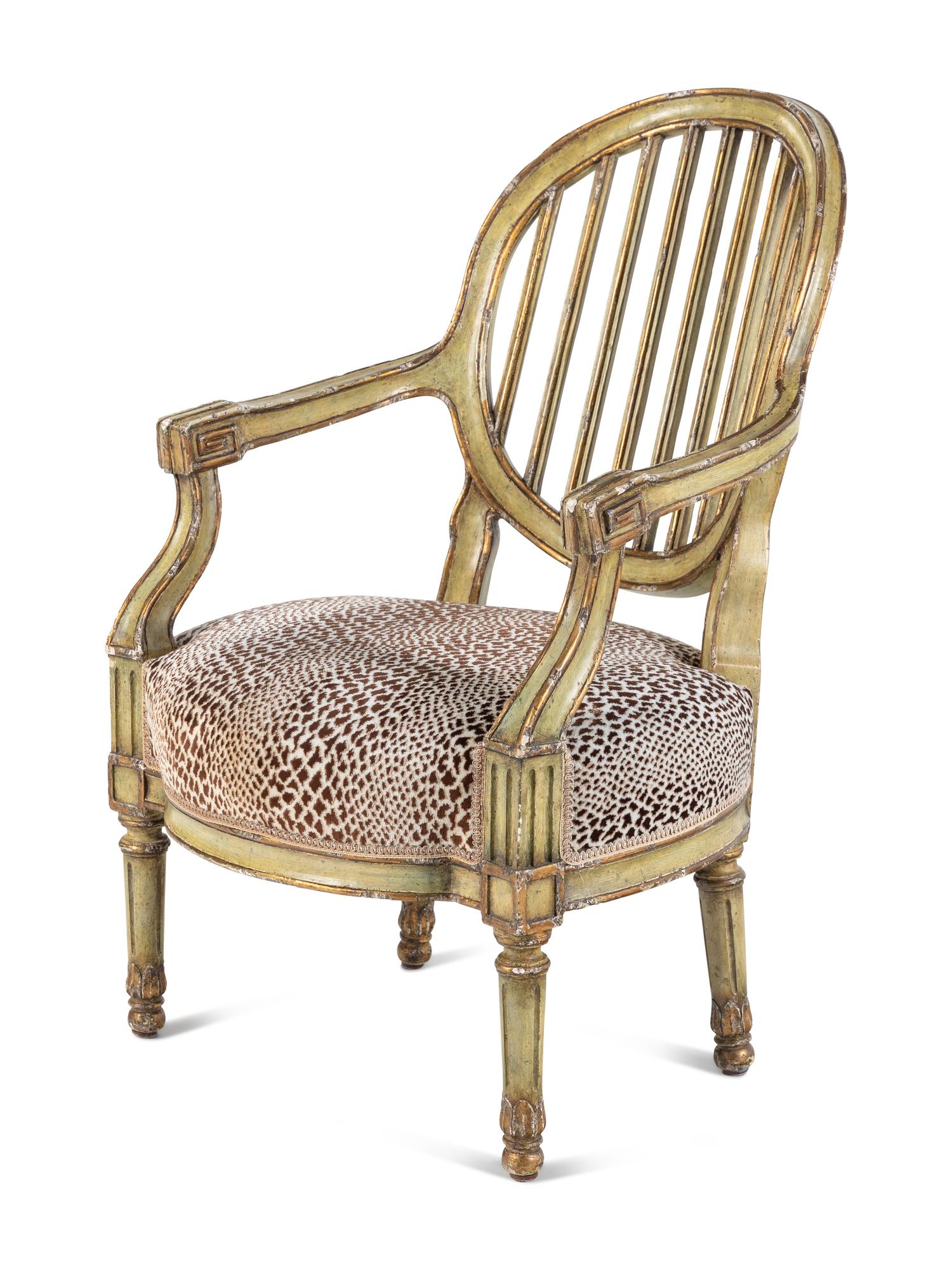 A Louis XVI Style Painted and Parcel-Gilt Fauteuil