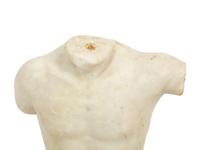 A Continental Carved Marble Male Torso
