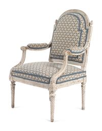 A Pair of Louis XVI Provincial White-Painted Fauteuils