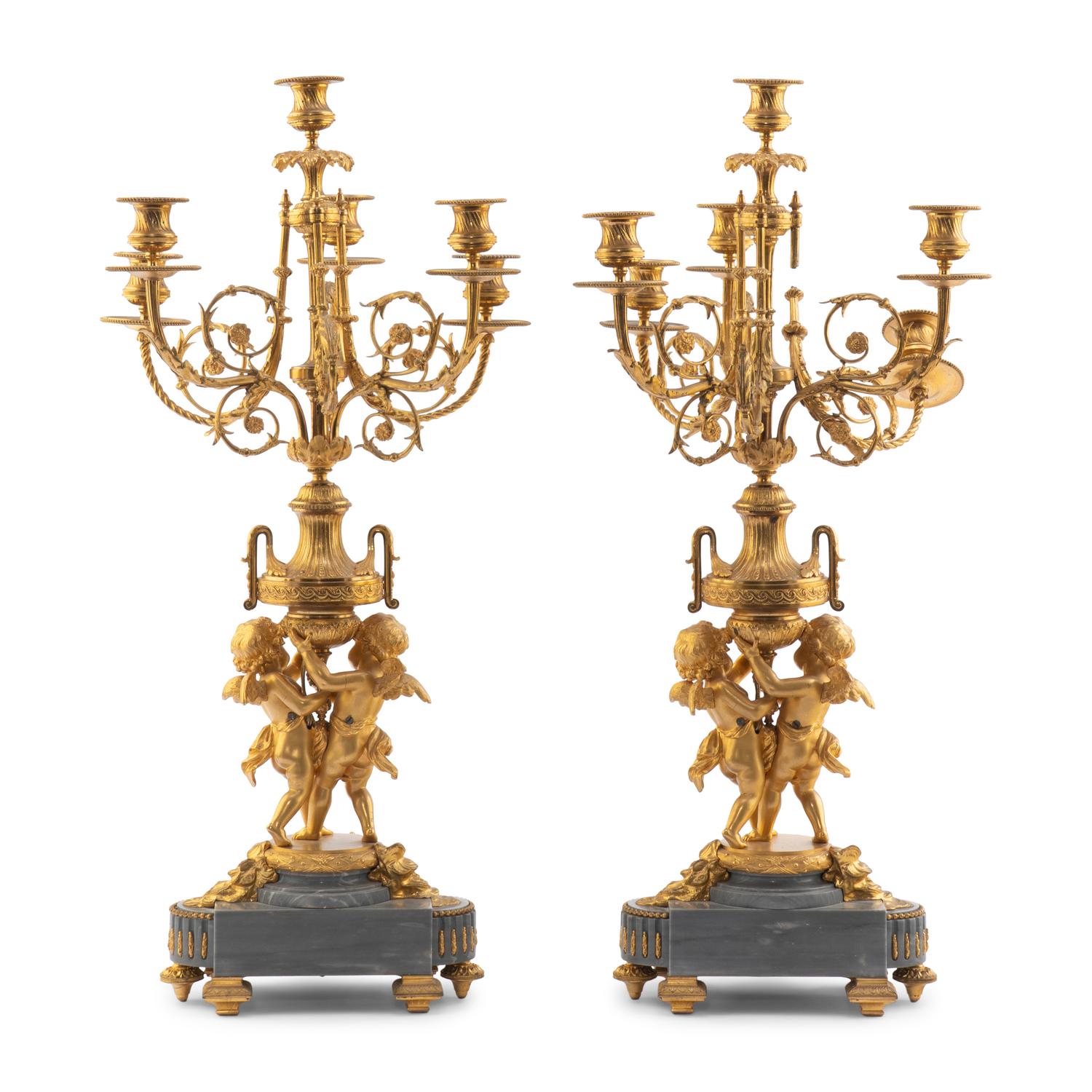 A Pair of Louis XV Style Gilt Bronze and Persian Grey Marble Six-Light Candelabra