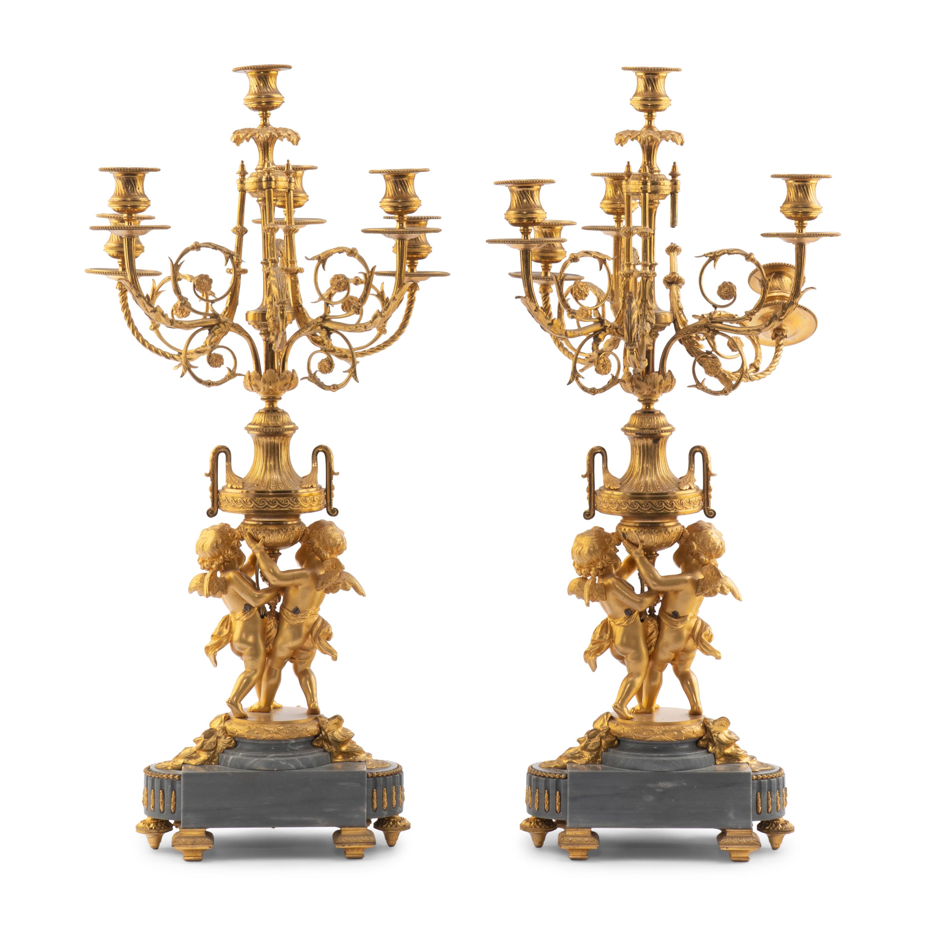 A Pair of Louis XV Style Gilt Bronze and Persian Grey Marble Six-Light Candelabra