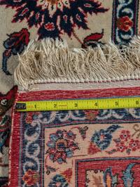 A Persian Wool Rug