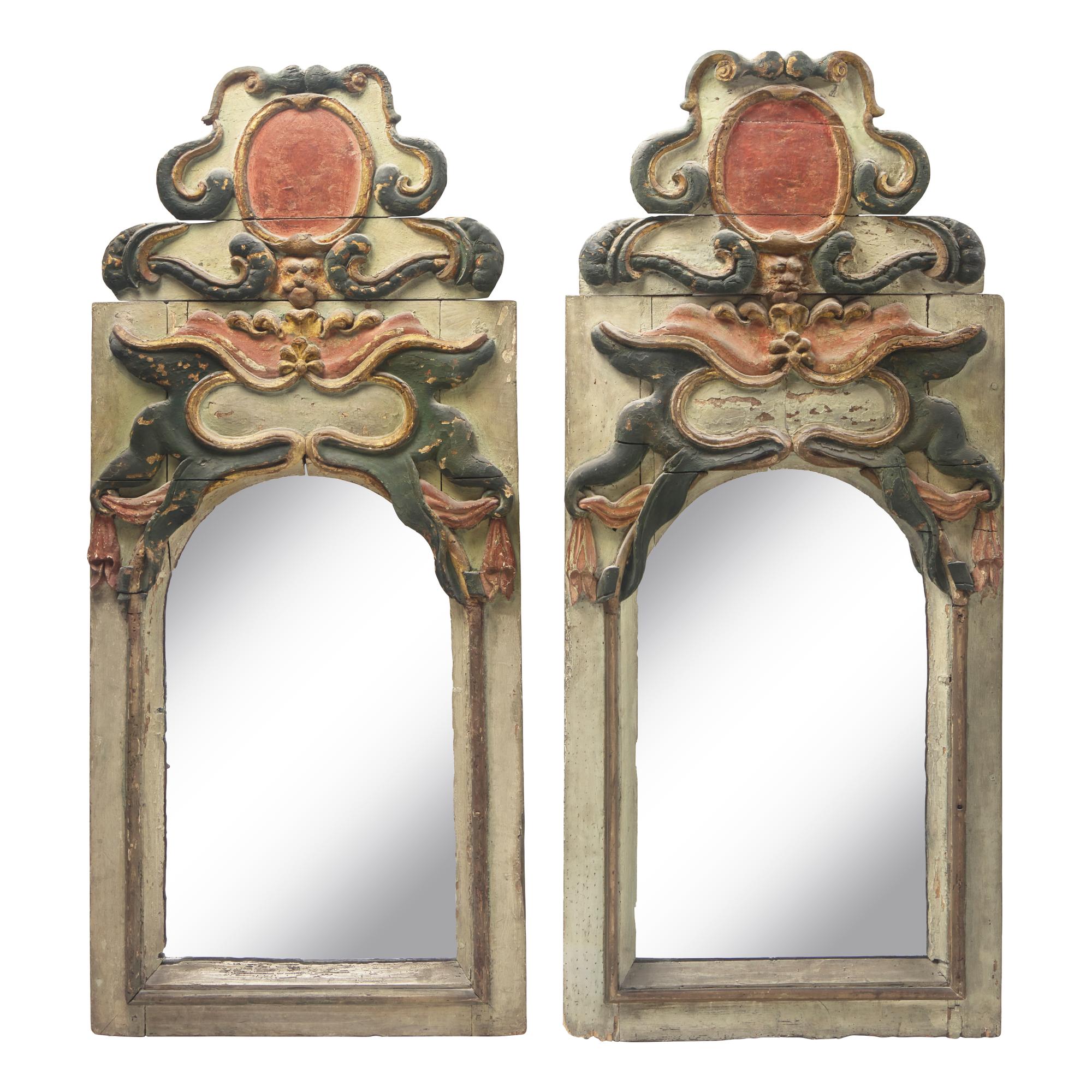 A Pair of Baroque Painted and Parcel-Gilt Looking Glasses