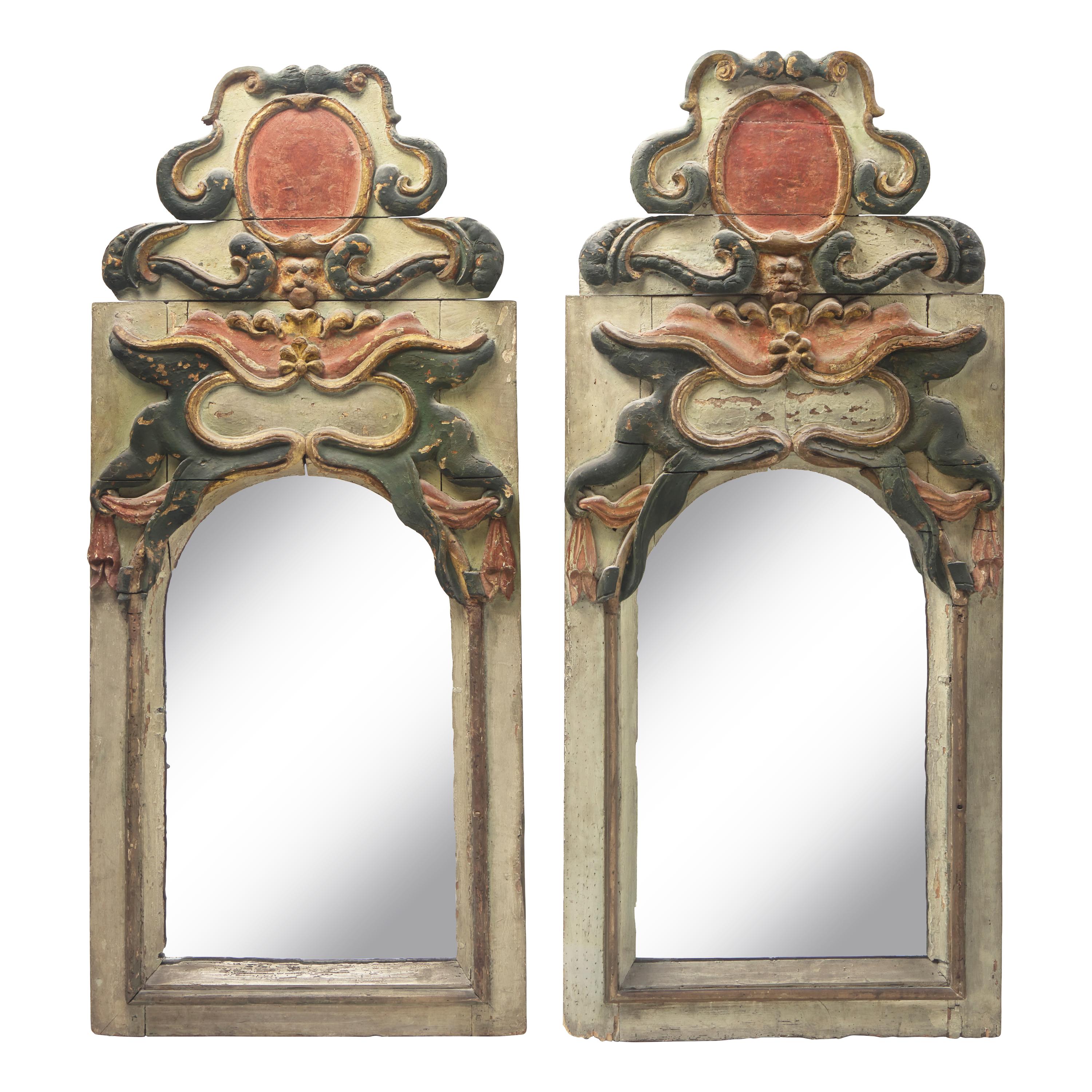A Pair of Baroque Painted and Parcel-Gilt Looking Glasses