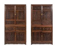 A Pair of Chinese Export Carved Hardwood Cabinets