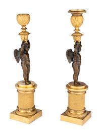 A Pair of Restauration Ormolu and Patinated Bronze Figural Candlesticks