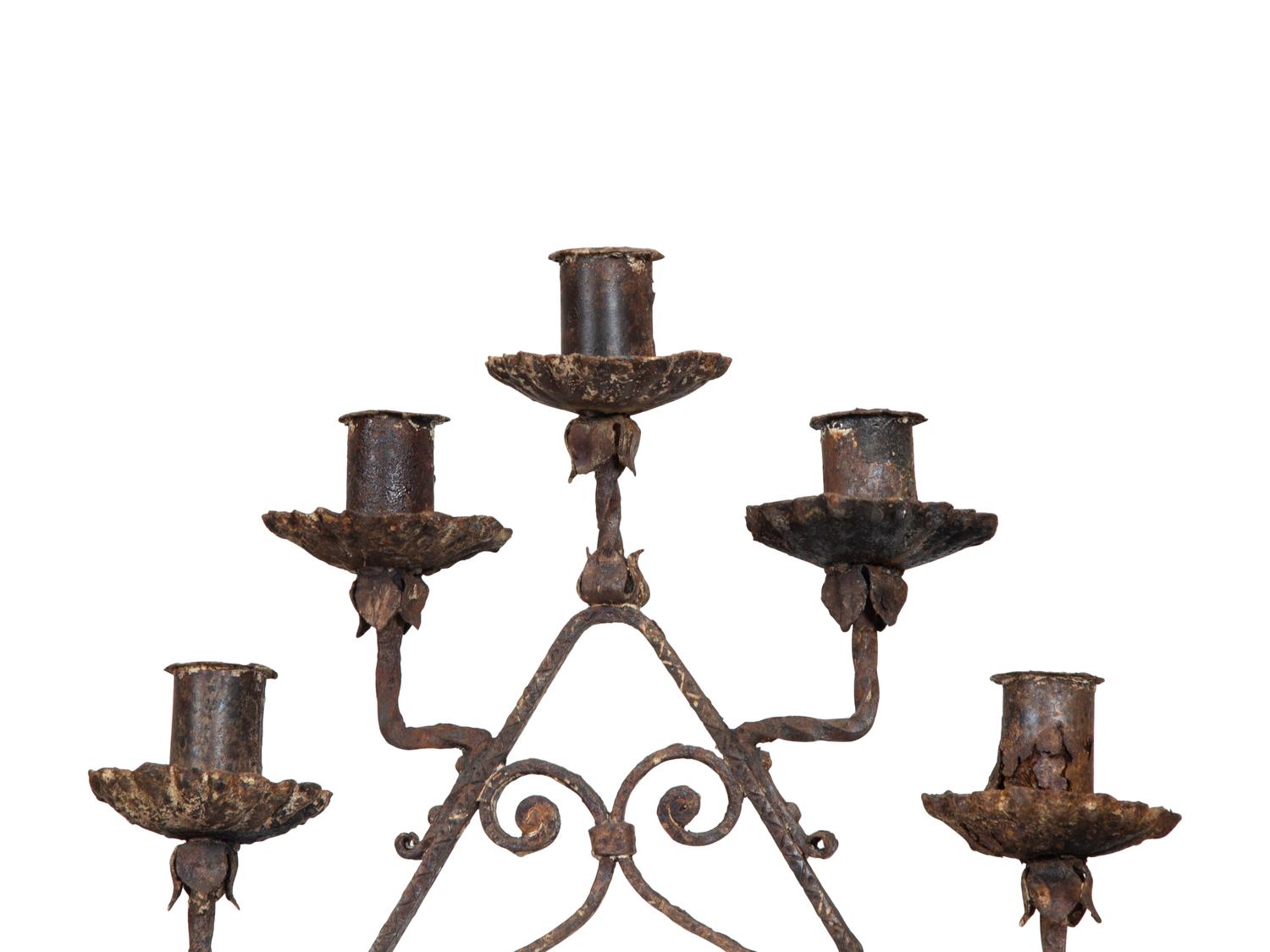 A Pair of Mizner Wrought Iron Seven-Light Floor Candelabra