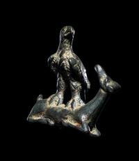 A Roman Bronze Eagle Grasping a Deer