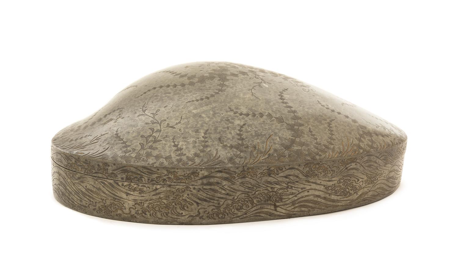 A Japanese Parcel Gilt Pewter Clam-Shaped Box 18TH/19TH CENTURY Width 11 x diameter 8 3/4 x height 3 inches. — 18TH/19TH CENTURY