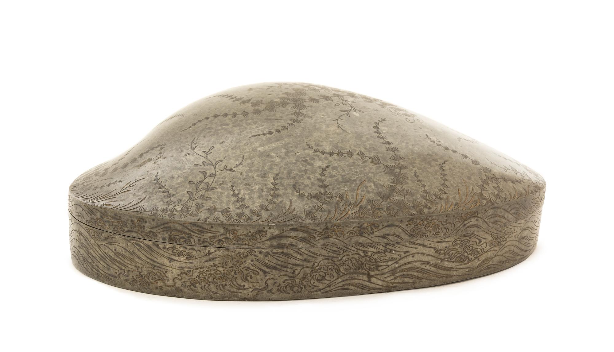 A Japanese Parcel Gilt Pewter Clam-Shaped Box 18TH/19TH CENTURY Width 11 x diameter 8 3/4 x height 3 inches. — 18TH/19TH CENTURY
