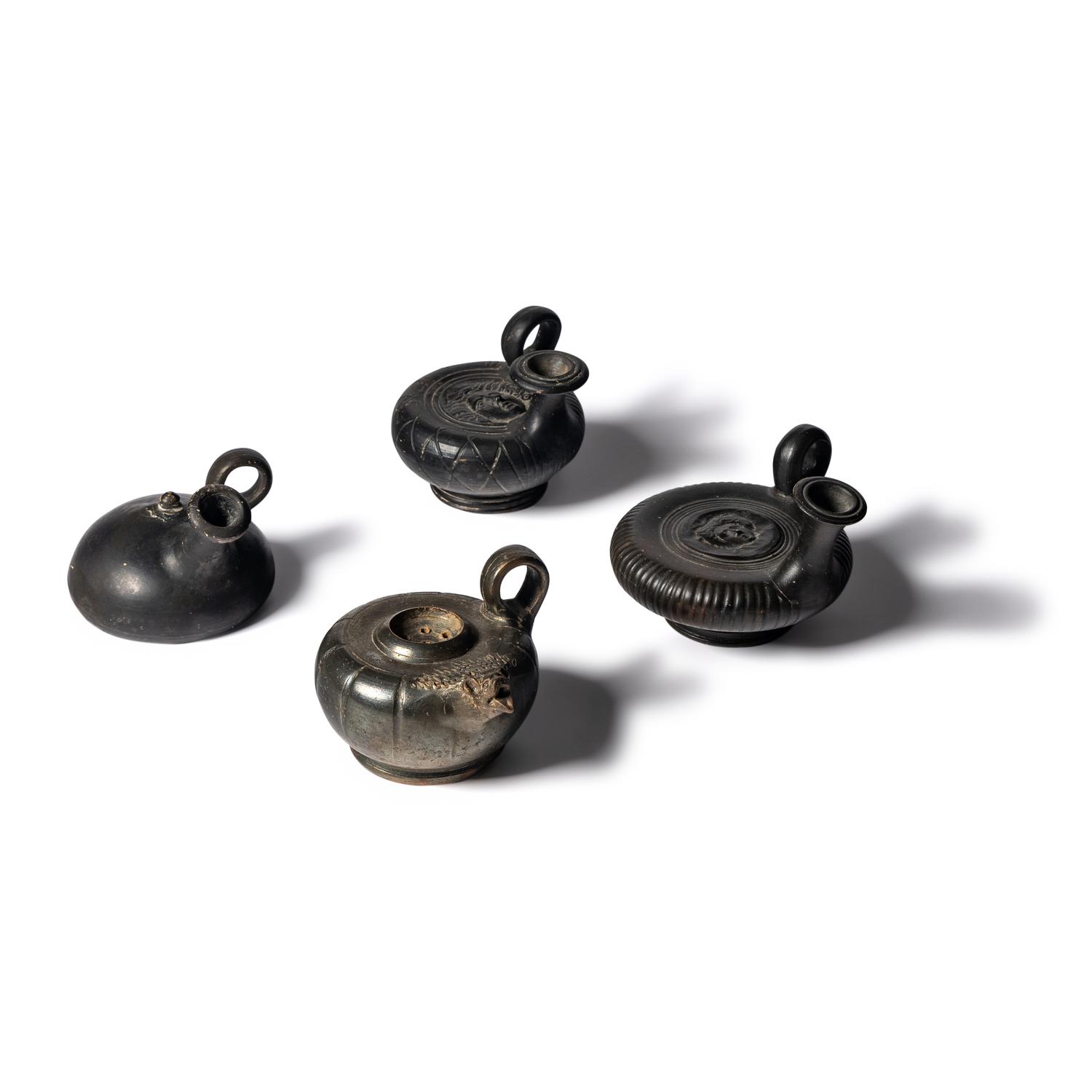Four Greek Black-Glazed Vessels