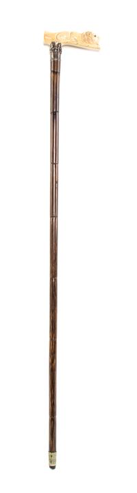 An American Ivory Handled Cane, Length of handle 4 3/8 x length overall 35 inches.