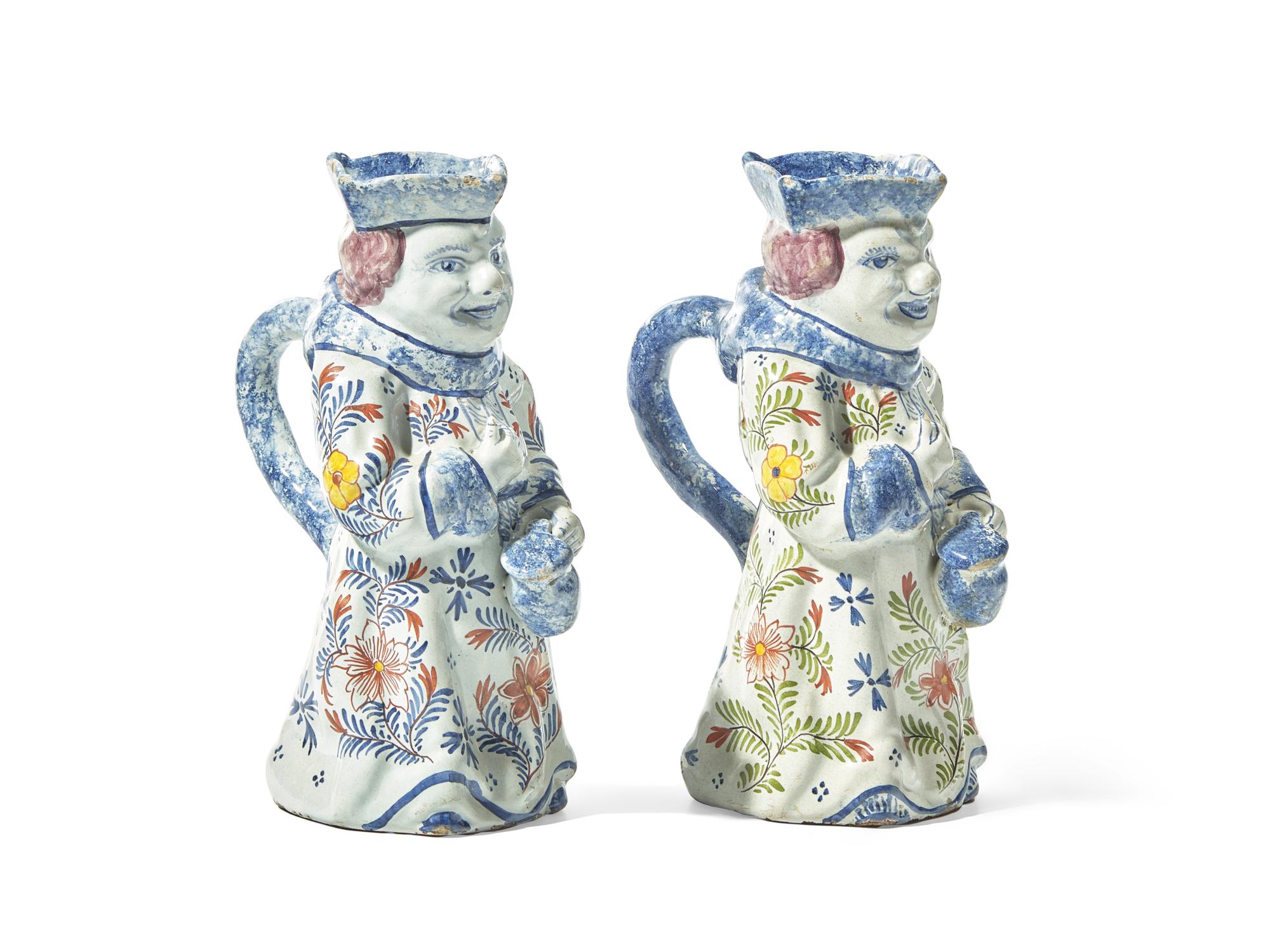 A Pair of Dutch Delft Polychrome Toby Jugs