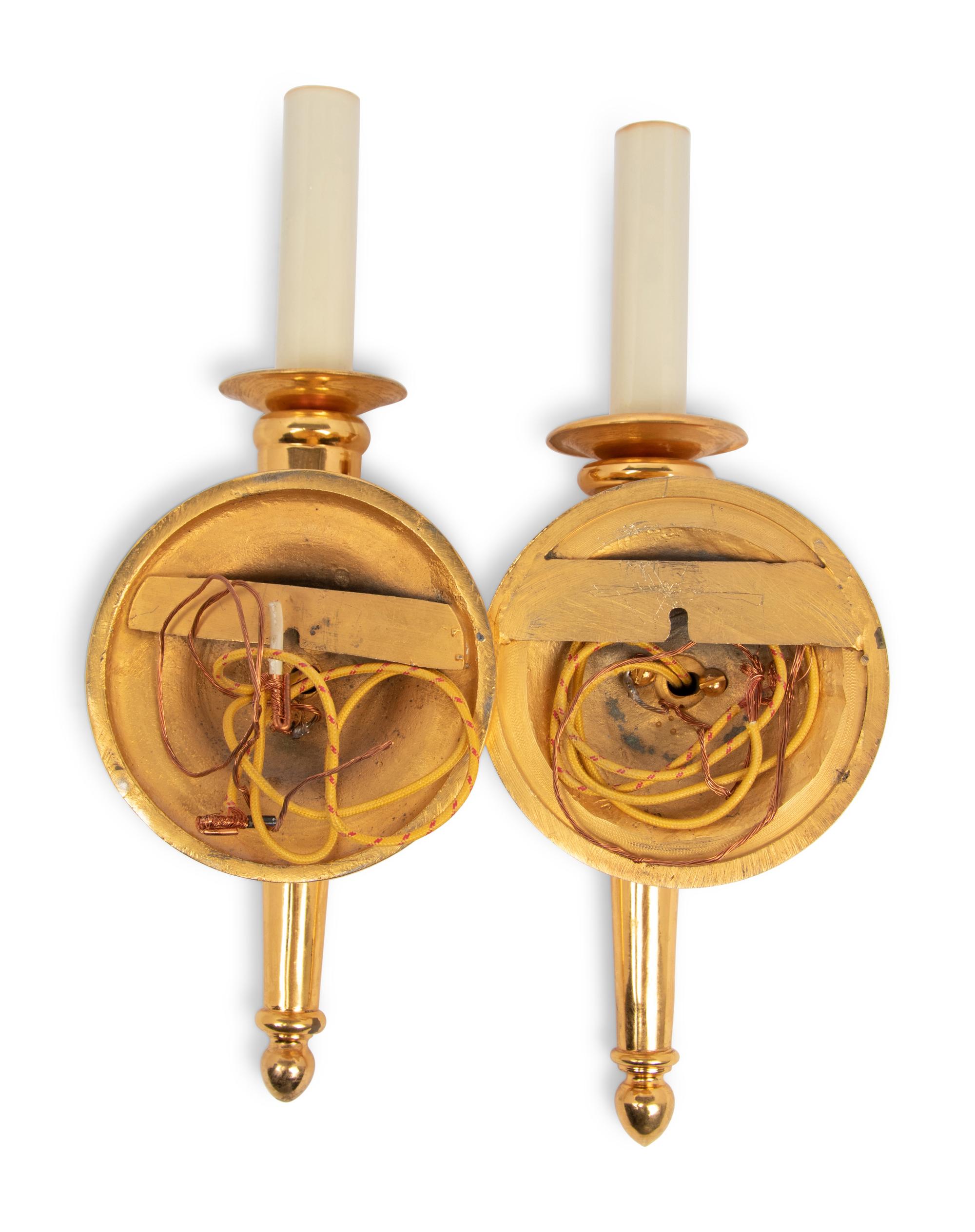 A Pair of Gilt Bronze Sconces in the Style of André Arbus