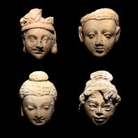 Three Gandharan Fragmentary Stucco Heads and One European Fragmentary Stucco Head