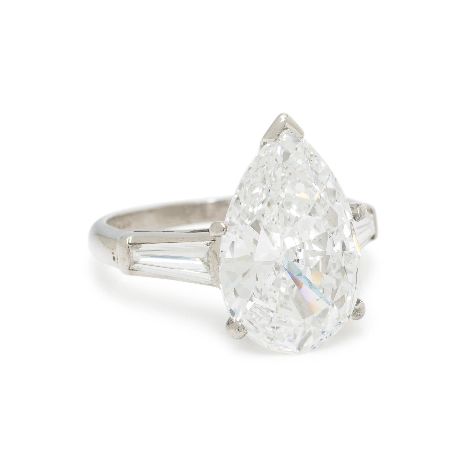 LASER DRILLED PEAR SHAPED DIAMOND AND PLATINUM RING