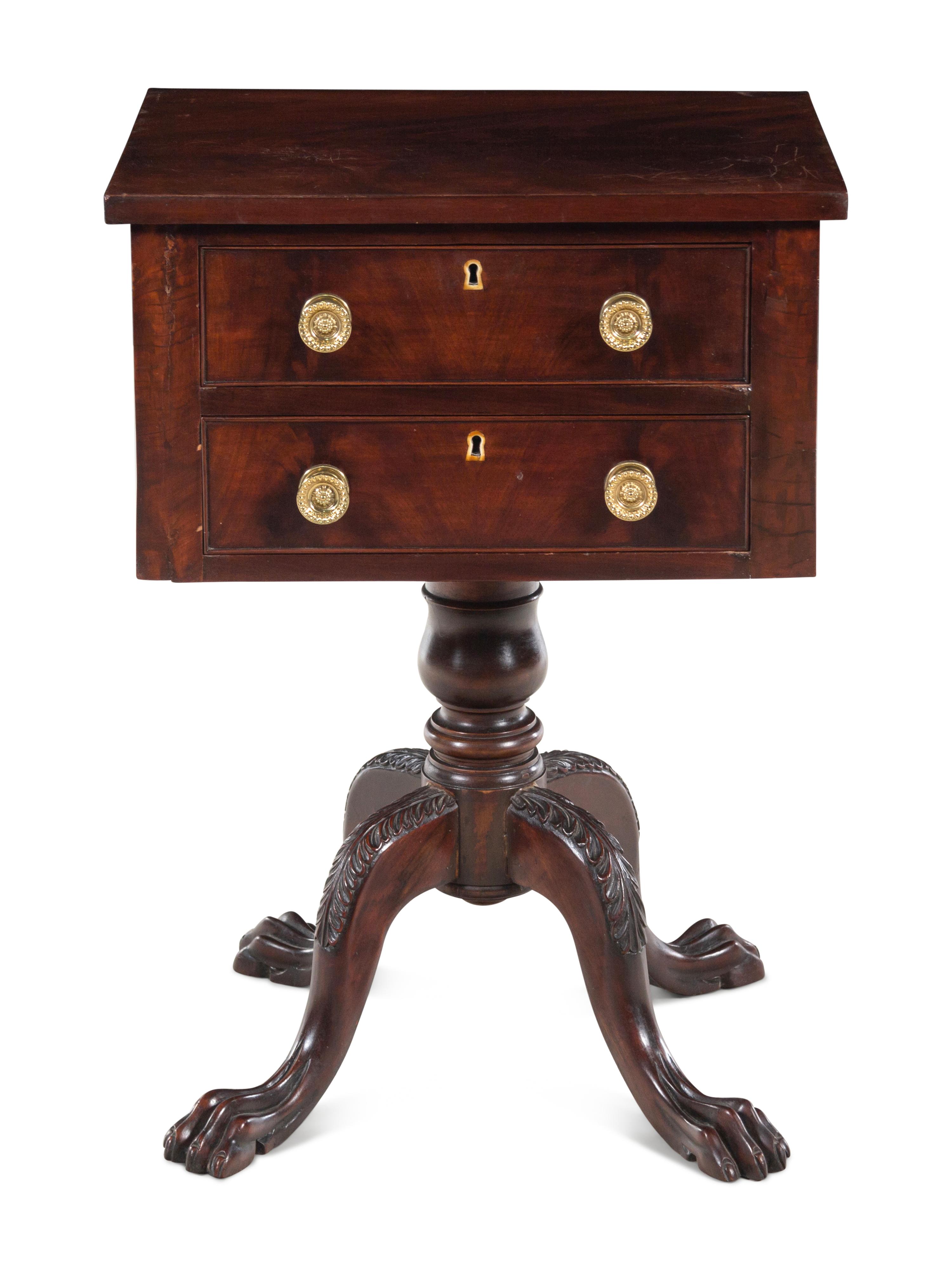 A Late Classical Carved and Figured Mahogany Work Table