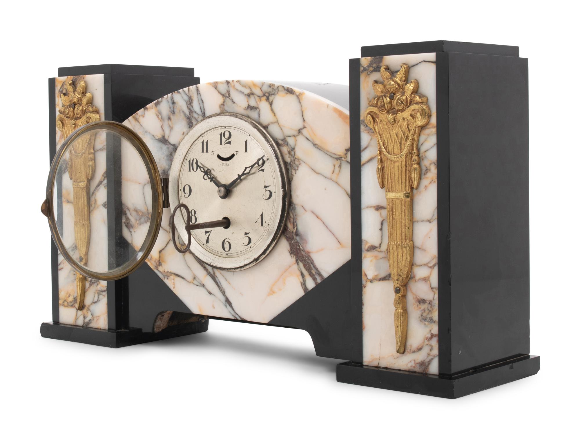 An Art Deco Gilt Metal Mounted Marble Mantel Clock