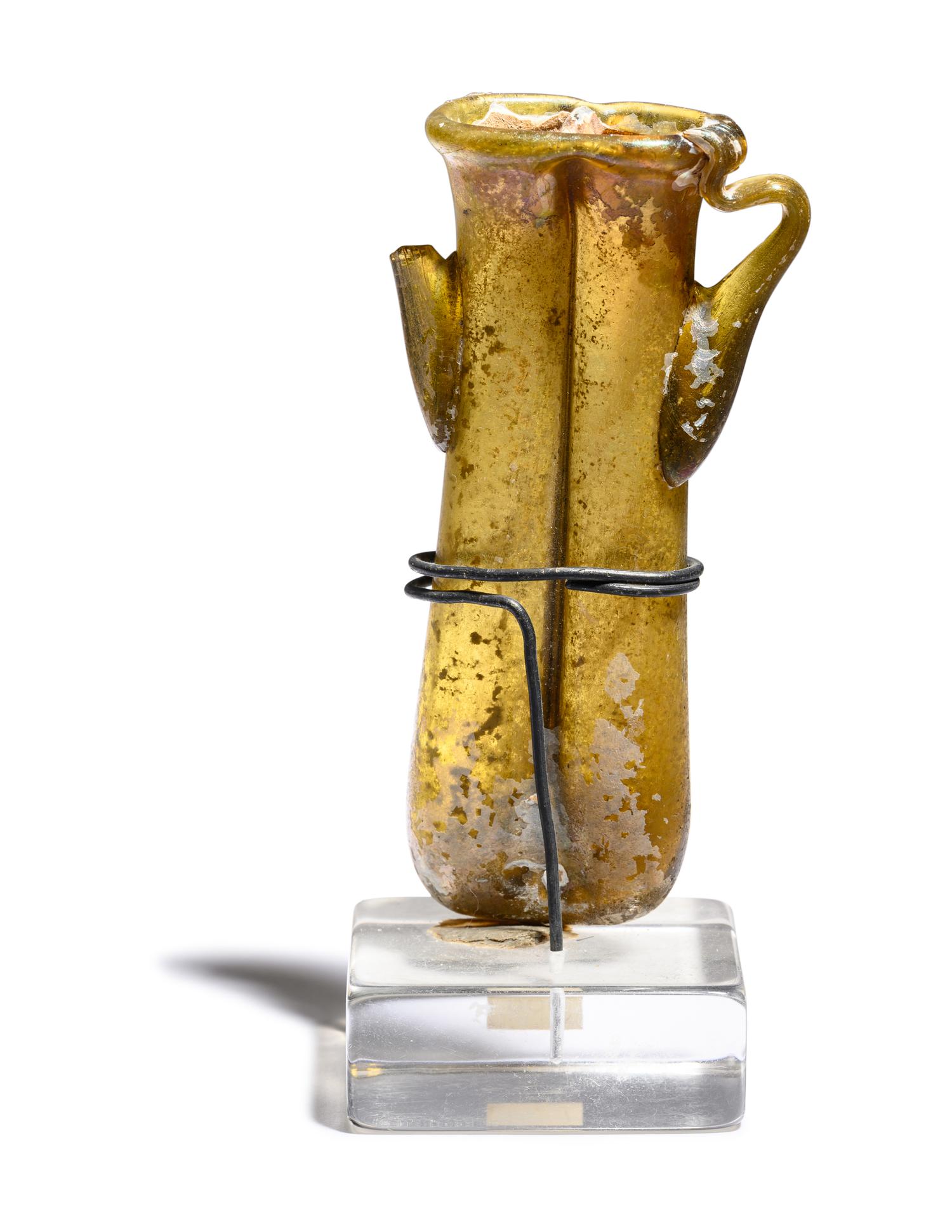 A Roman Yellow-Green Glass Double Unguentarium