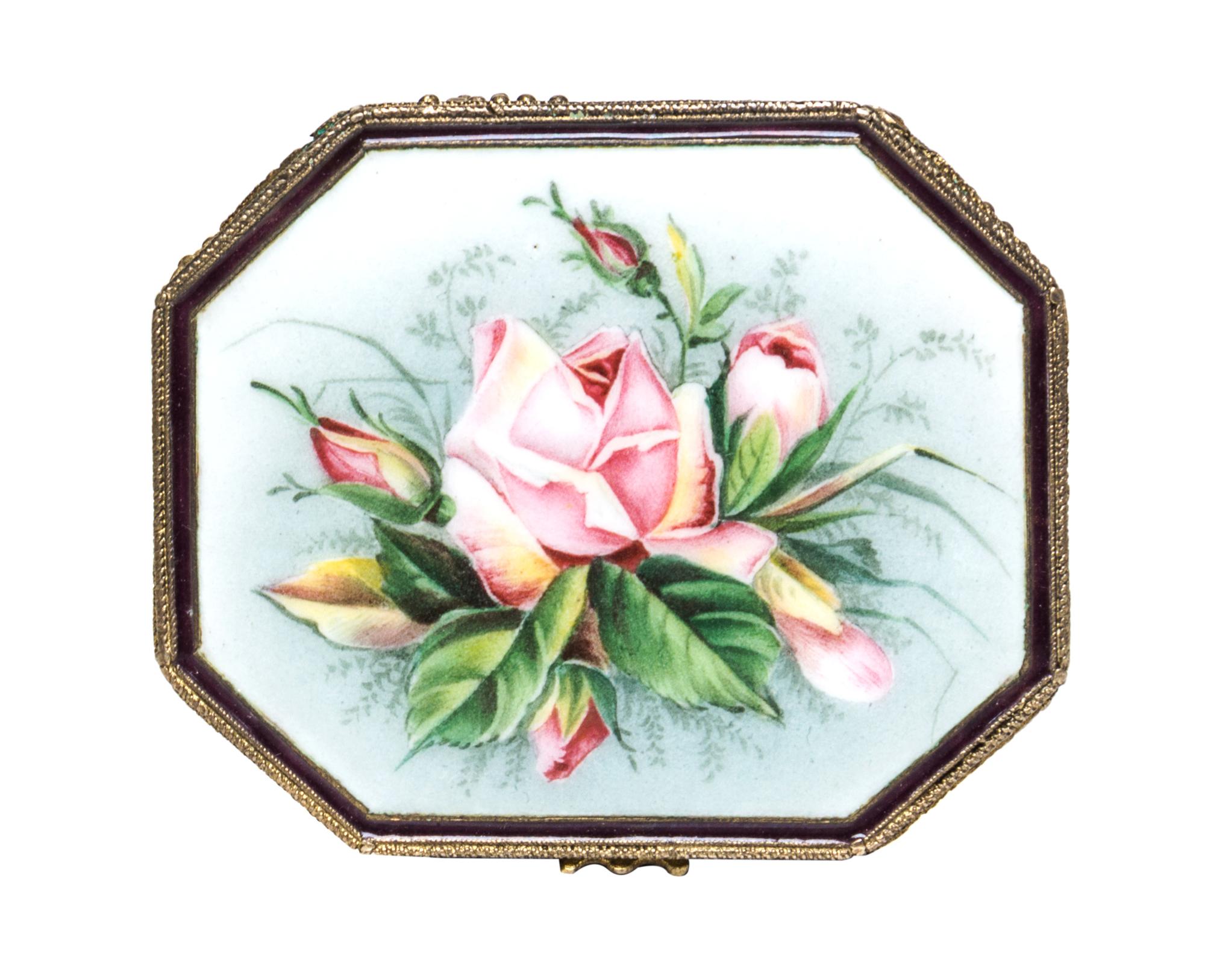 A Russian Enameled Gilt-Silver Box, Konstantin Skvortsov, Moscow, 1908-1926, of elongated octagonal form, the lid centered with a rose.