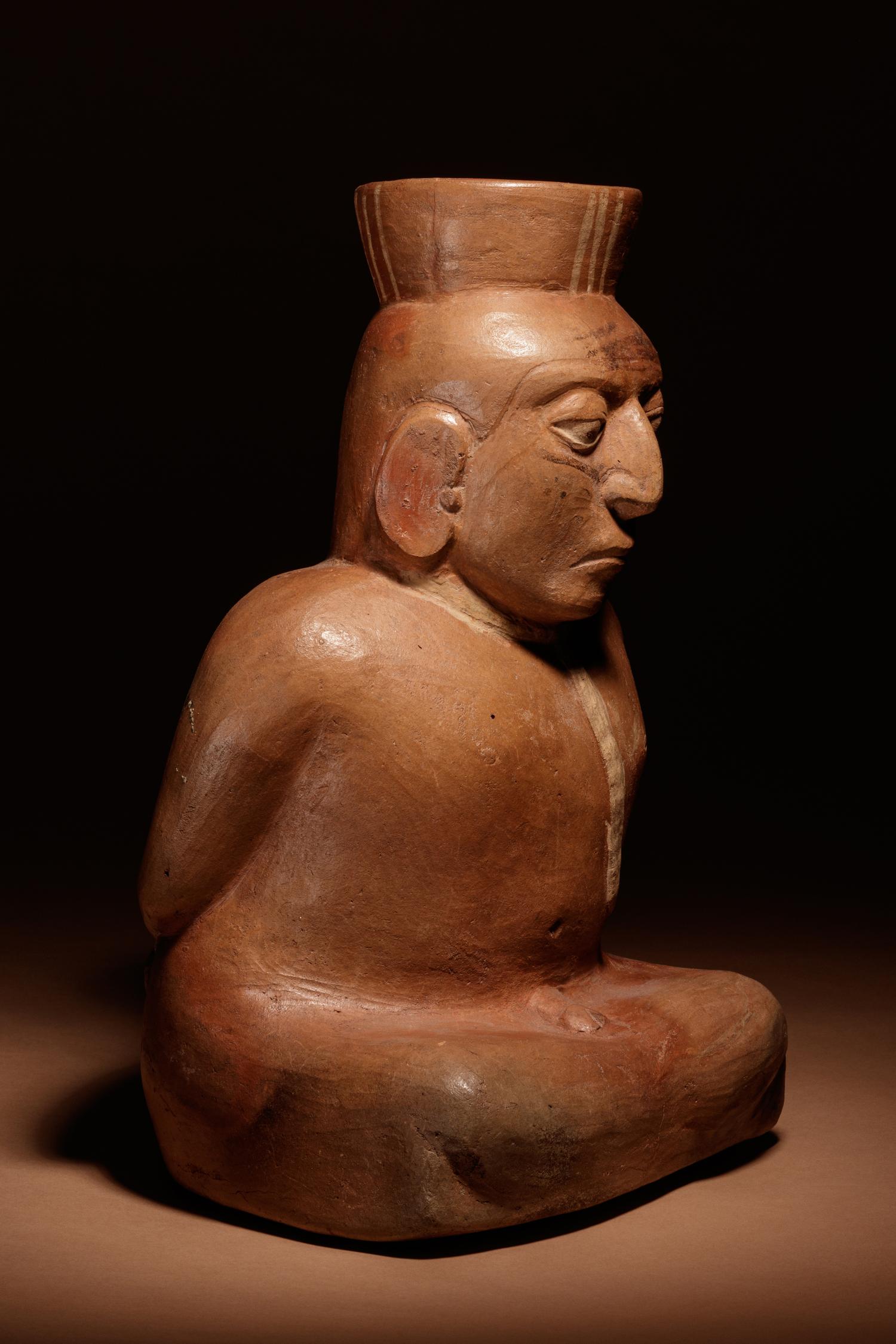 A Moche Terracotta Vessel Depicting a Bound Captive