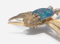 A 14K Yellow Gold, Black Opal, and Diamond Brooch