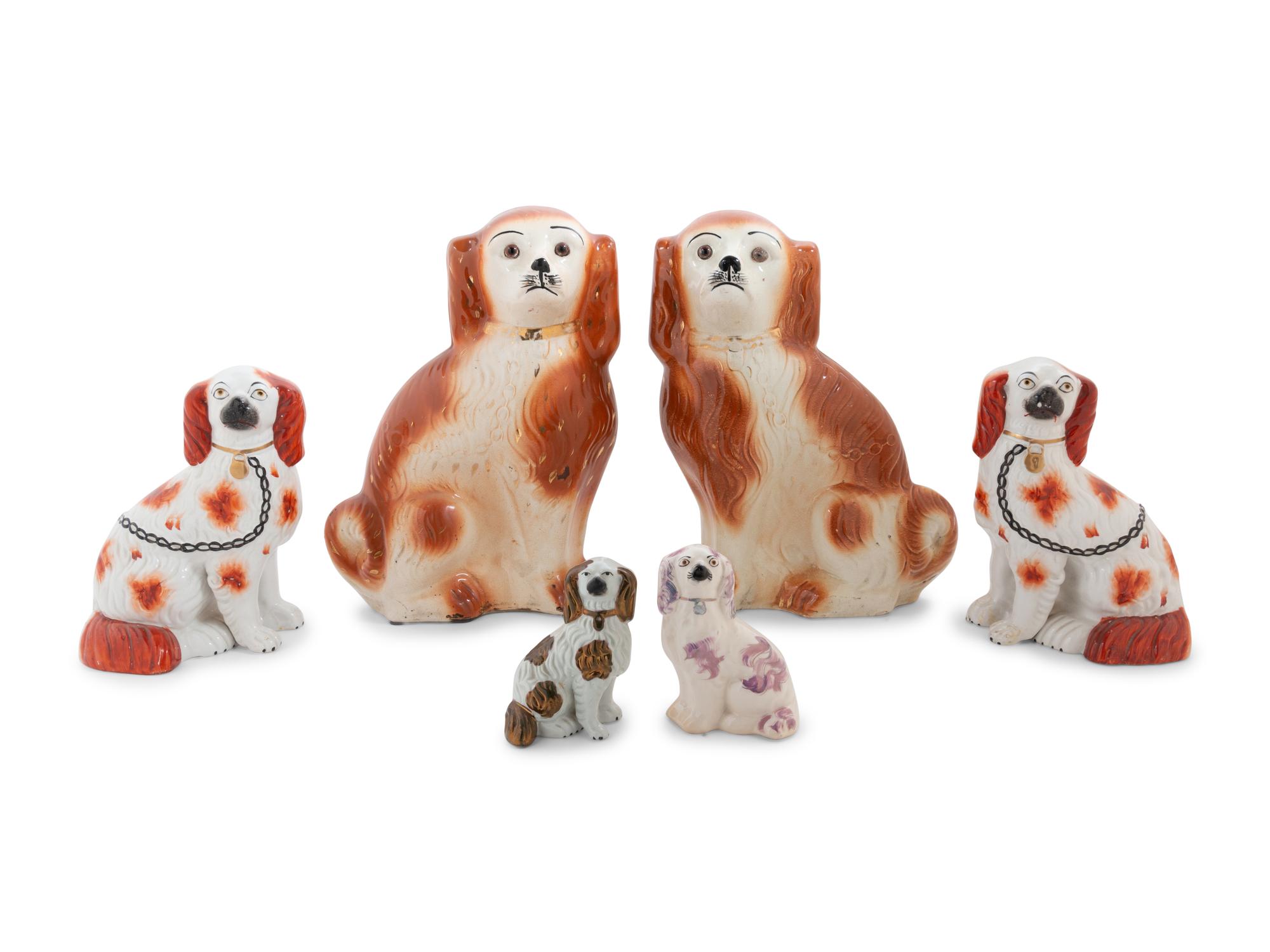 A Group of Fourteen Staffordshire Glazed Spaniels