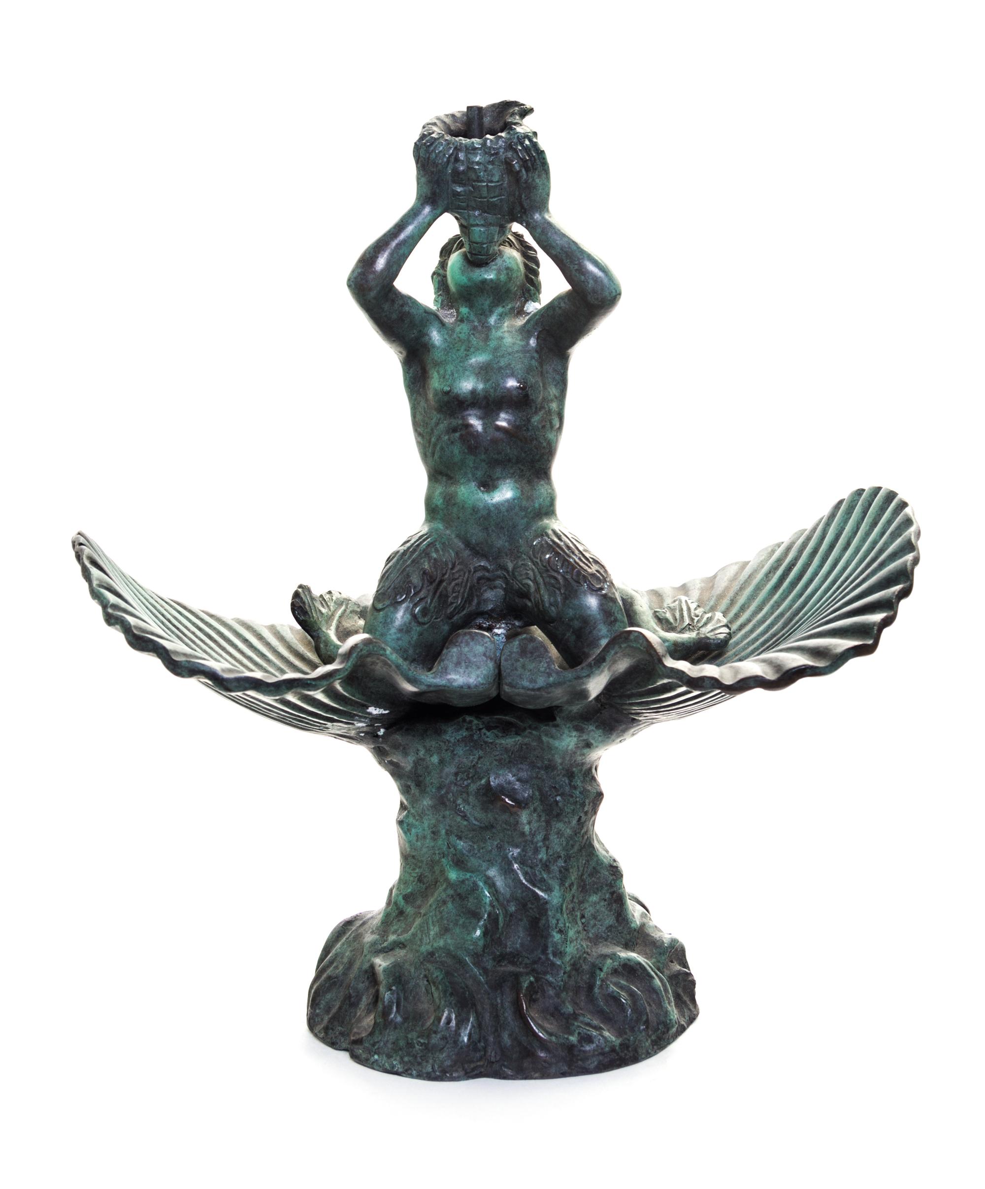 A Neoclassical Patinated Bronze Fountainhead Height 11 inches.