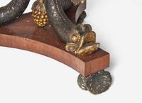A Regency Parcel Gilt and Figured Mahogany Breakfast Table