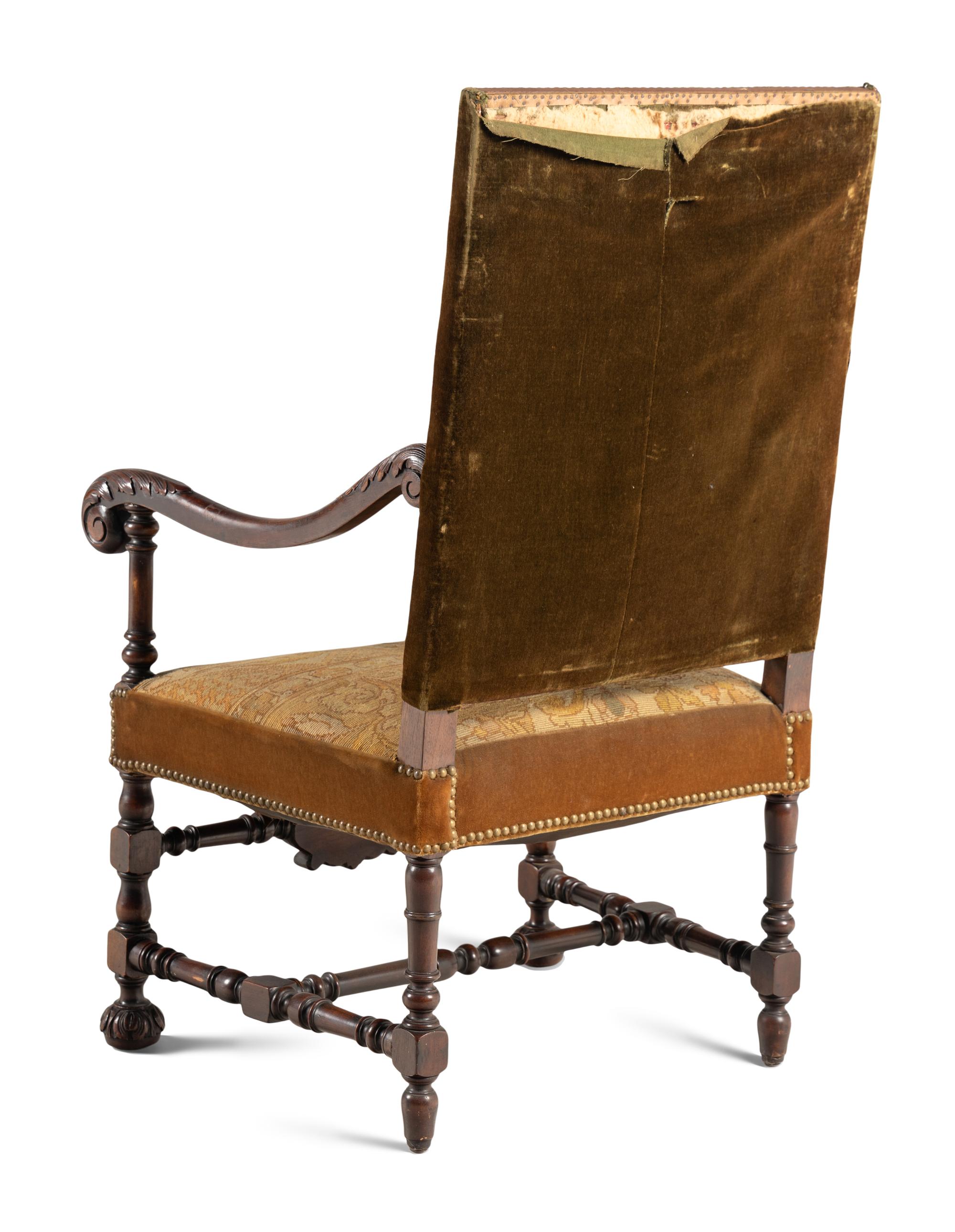 A William and Mary Style Carved Walnut Armchair