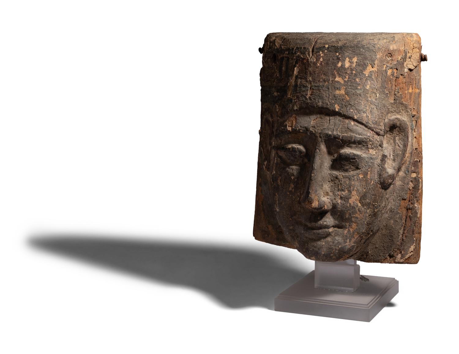 An Egyptian Painted Wood Mummy Mask