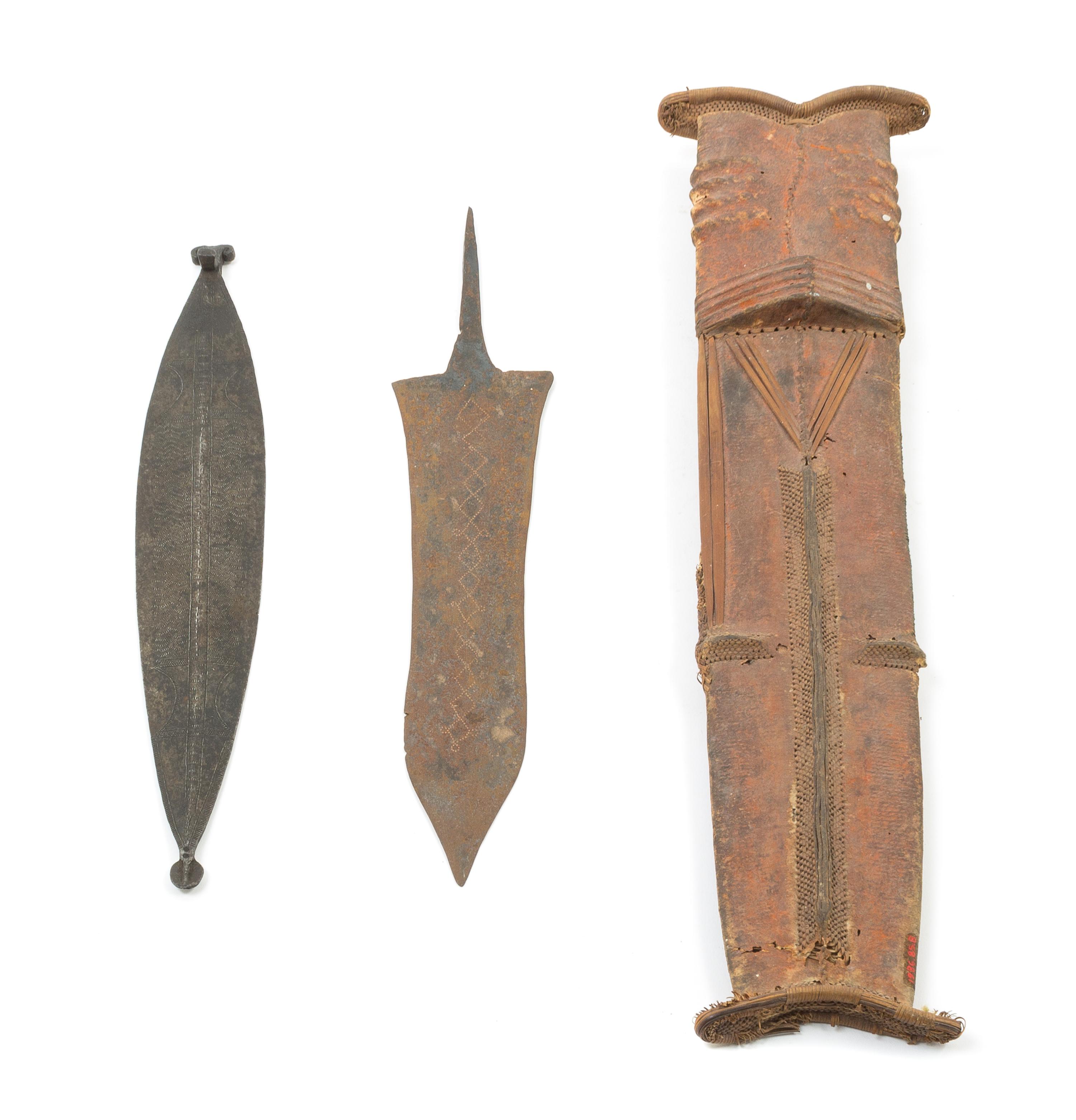 A Chokwe Knife and Sheath Length of sheath 19 inches. — CONGO/NAMIBIA, 19TH/20TH CENTURY