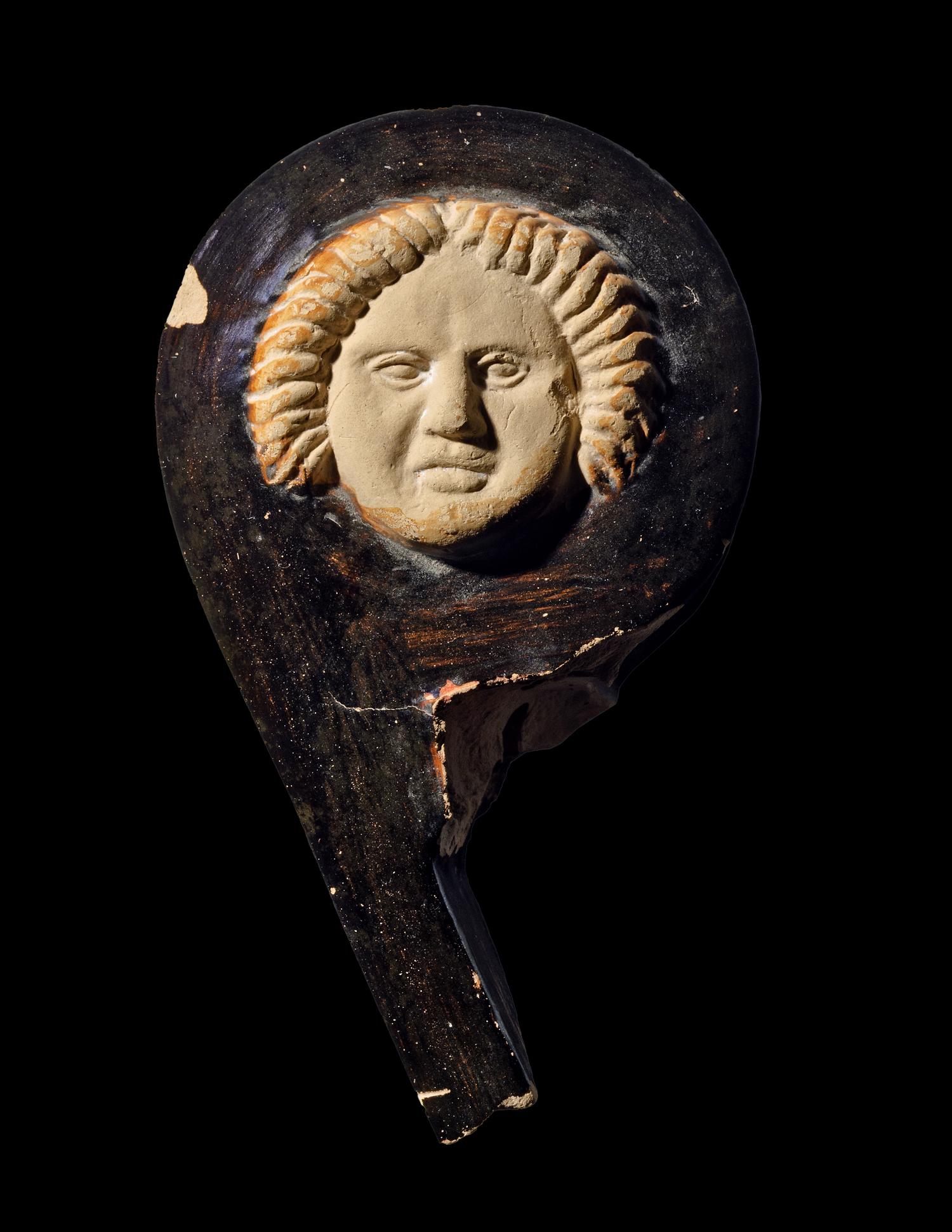 An Apulian Red-Figured Volute-Krater Handle Fragment