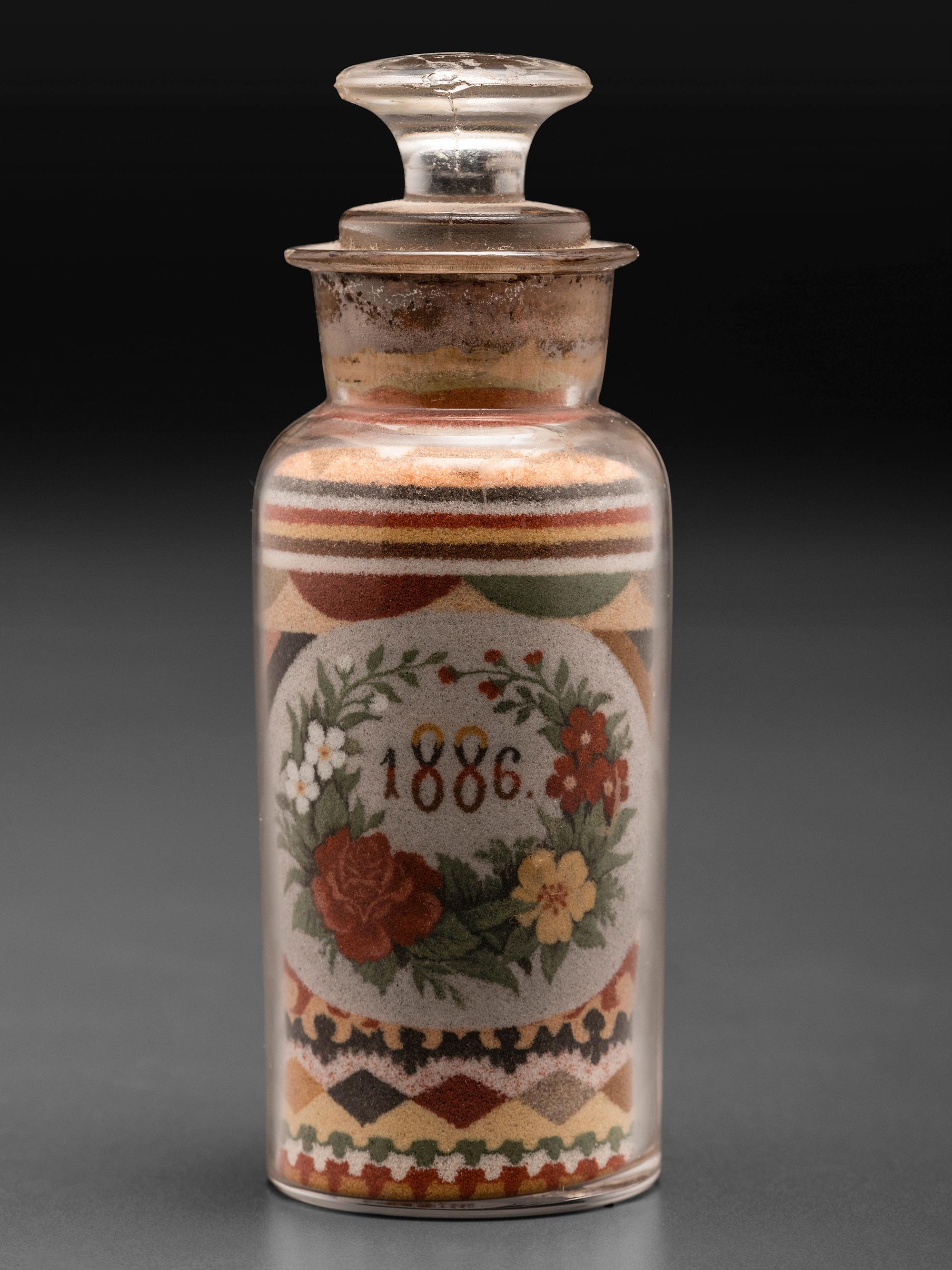 An Andrew Clemens (American, 1857-1894) Eagle Sand Bottle